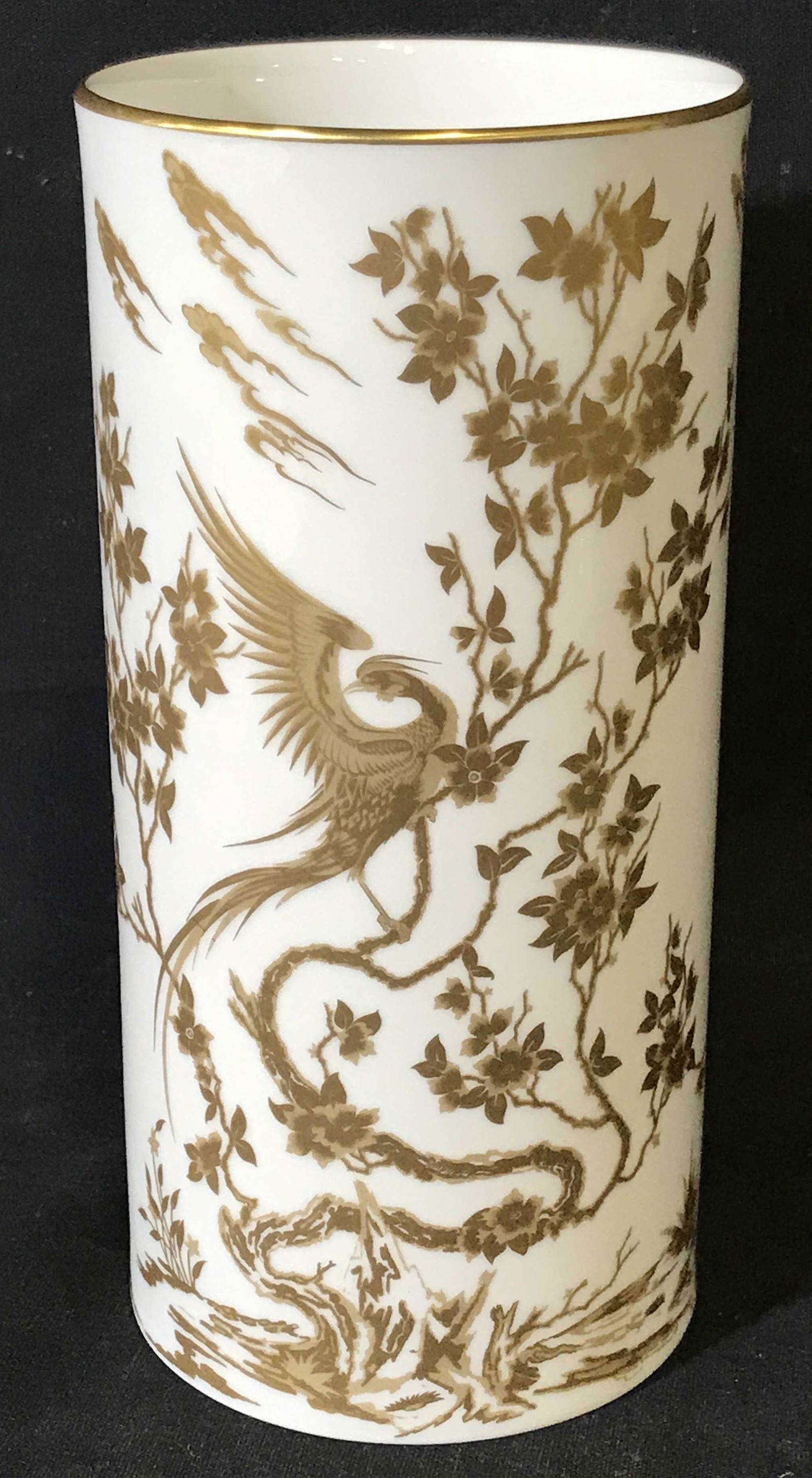 Hutschenreuther German Gilt Porcelain Vase: German gilt porcelain vase, label to underside reads ‘Hutschenreuther, Germany’, cylinder shape, design to surface depicts a rooster on a tree in a chinese style, measures 8 inches tall and 4 inch