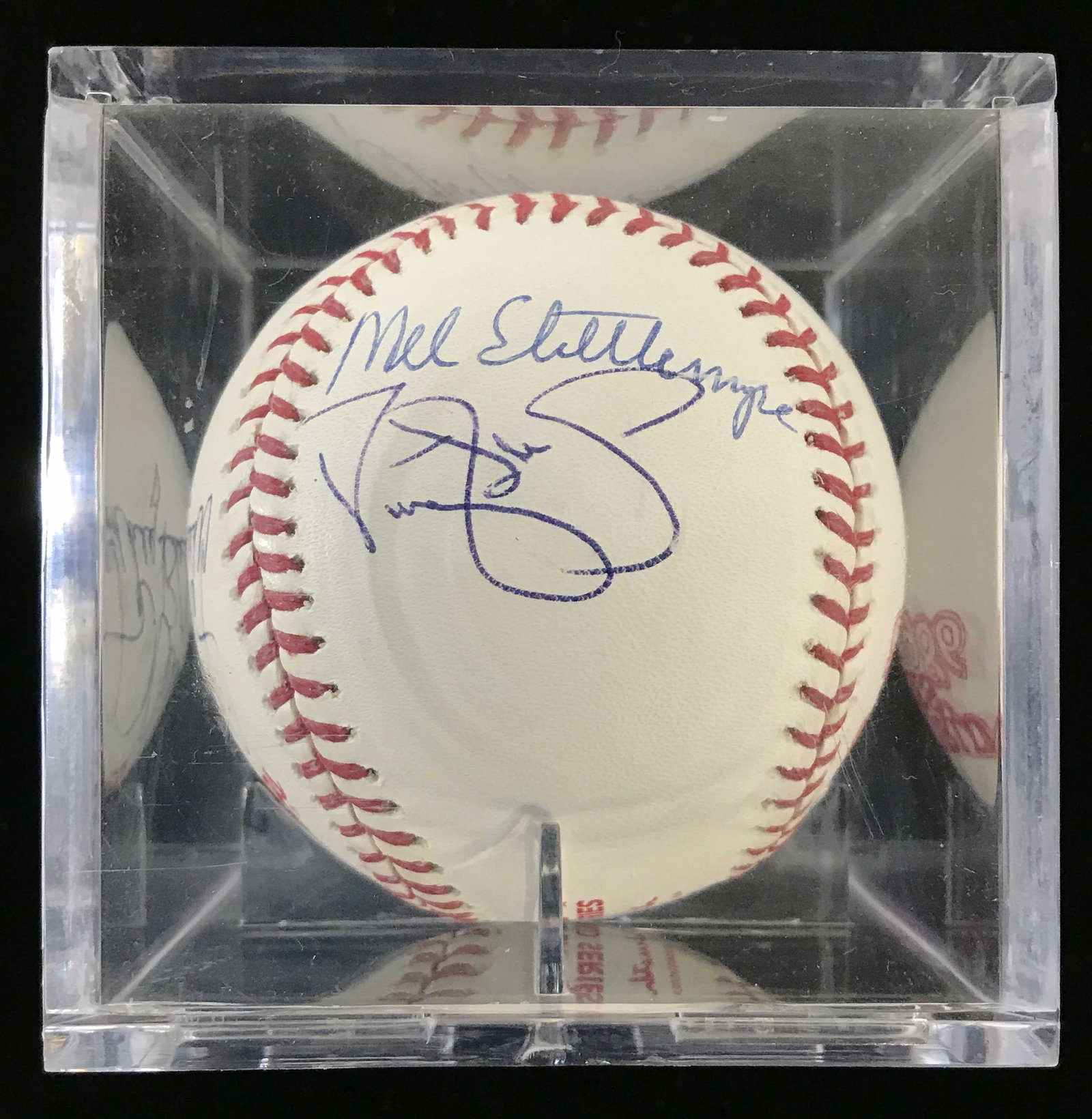Signed 1986 Official Ball World Series Baseball: Baseball has signatures some of which read DARRYL STRAWBERRY, BARRY LYONS, TIM TEUFEL, WALLY BACKMAN. Signatures appear to be names of some of the 1986 New York Mets Major League Baseball Team. Piece 