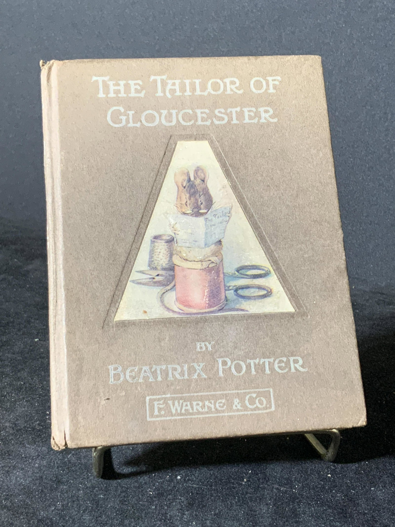 Tale of Gloucester Book by BEATRIX POTTER: THE TALE OF GLOUCESTER by BEATRIX POTTER. C. 1903. Published by Frederick Warne Co. Antique condition, some wear to pages & binding. Approx. 4 in. width. Approx. 5.5 in height. Antique collectibles, a