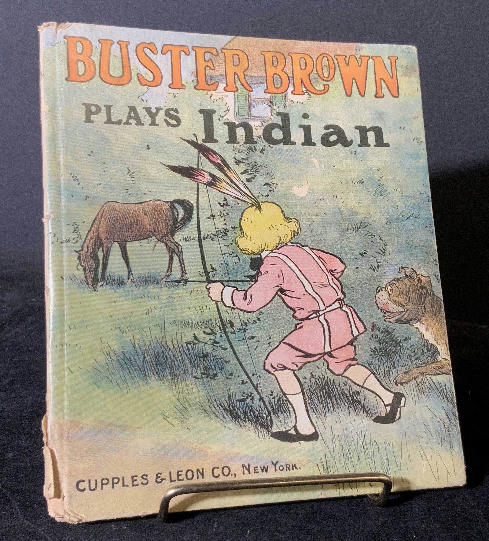Antique BUSTER BROWN Children’s Book: C. 1907 BUSTER BROWN PLAYS INDIAN children’s book. Published by Cupples & Leon Co. New York. Good antique condition. Part of the Buster a Brown Nuggets Collection. Approx. 6 in. width. Approx. 7.5 i