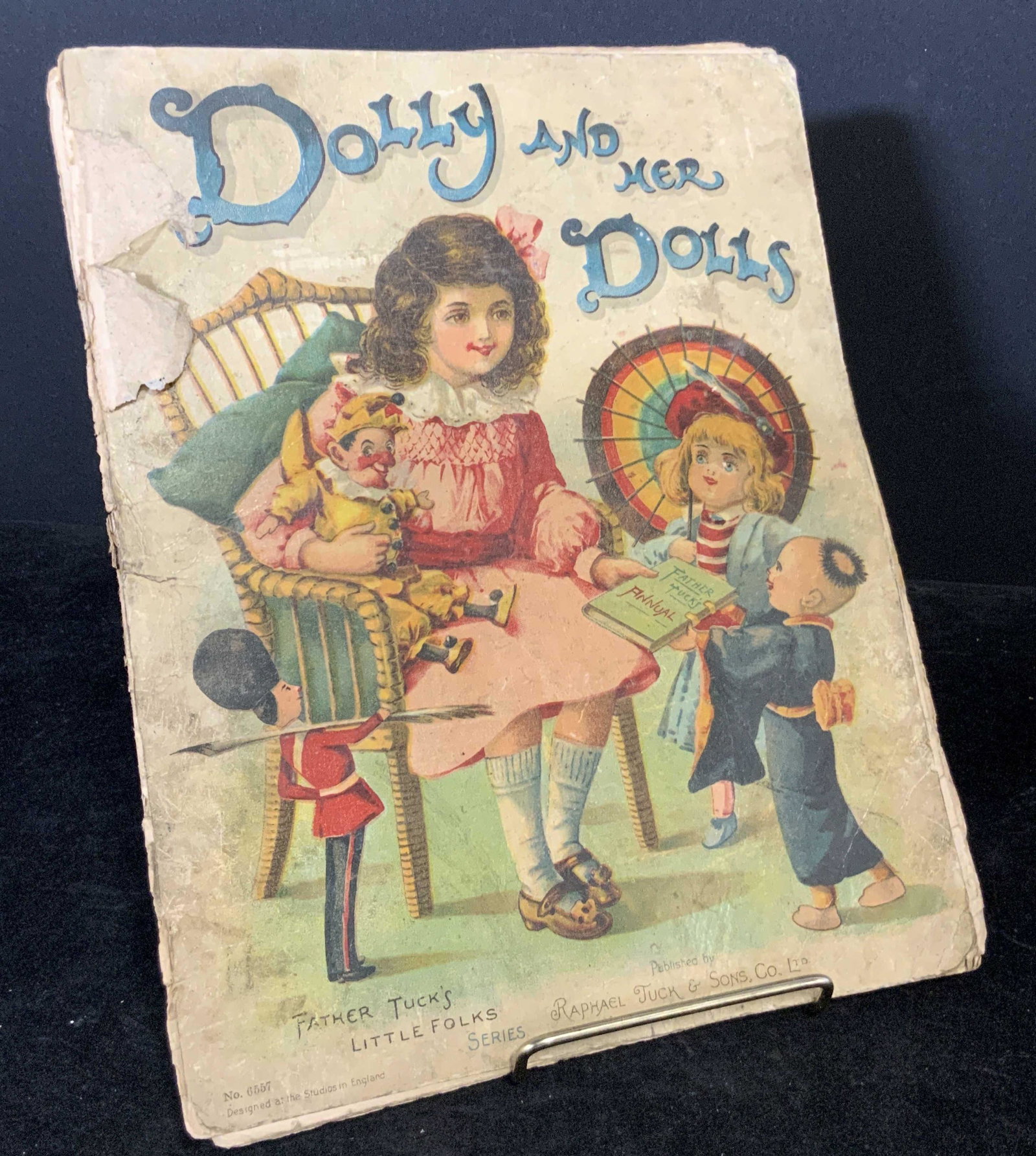 Vintage Children’s Book, DOLLY AND HER DOLLS: Vintage, possibly antique, children’s book titled: DOLLY AND HER DOLLS. From Father Tuck’s Little Folks Series. No. 6557. Published by Raphael Tuck & Sons. Co. Bindings in need of repair, wear & d