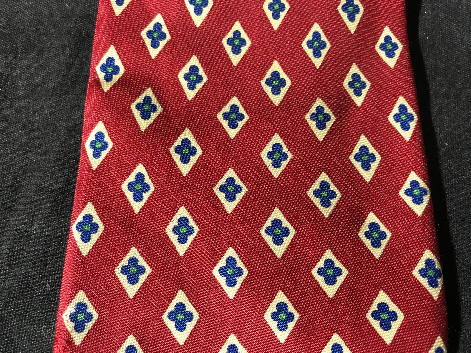 Pair GIORGIO ARMANI Italian Silk Ties: Pair Giorgio Armani Italian Silk Tie, label to reverse of each reads ’Giorgio Armani Cravatte Made in Italy’, pattern to ties are blue and red ties each with spots of white eyes and blue flowers r