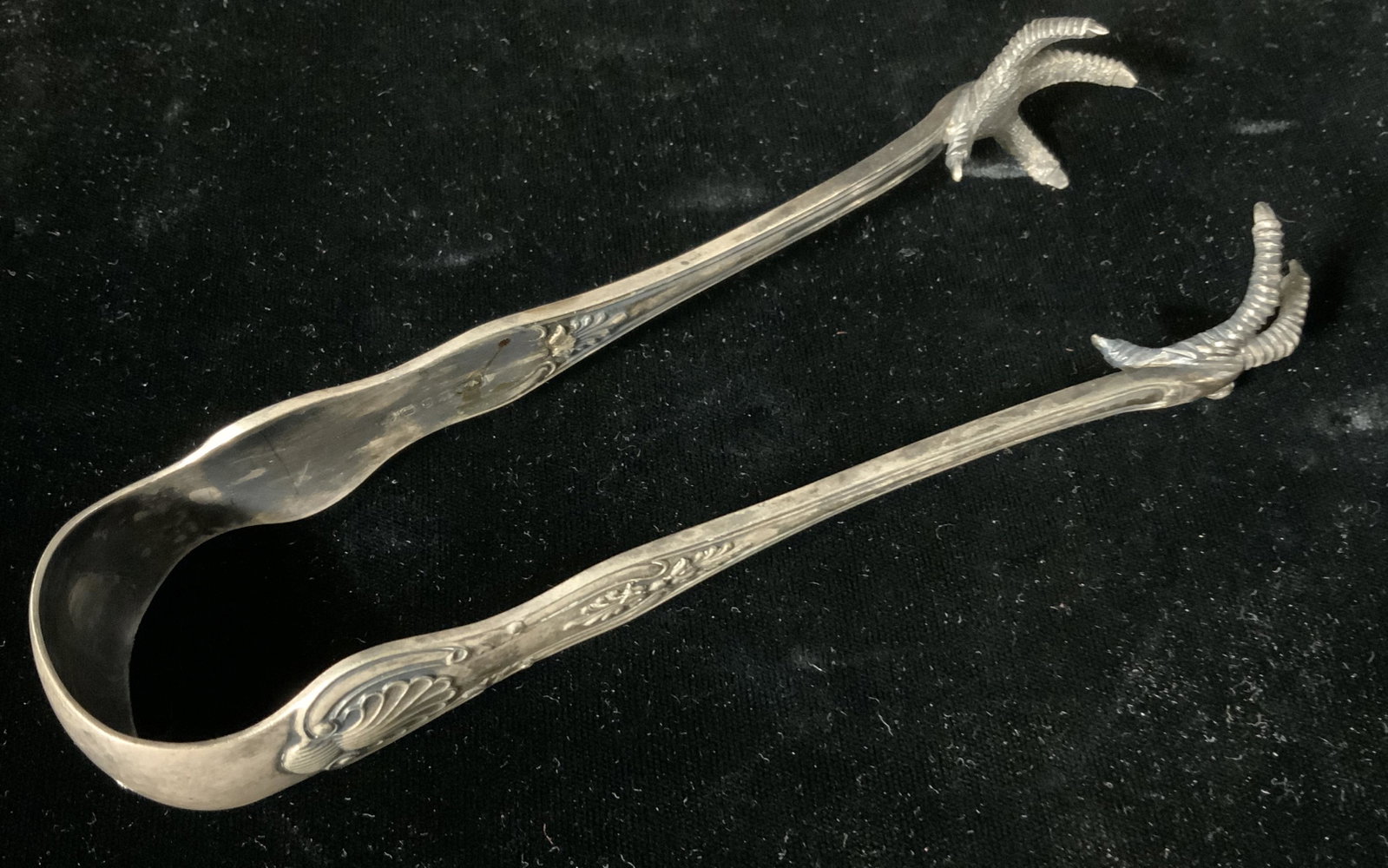 Vintage WH Claw Ice Tongs: Vintage WH Ice Tongs, inscription to piece partially illegible, reads ‘WH SB’, claw foot detail, measures 6 5/8 inches long x 2 1/4 inches at widest point, tarnishing to metal but overall in good 