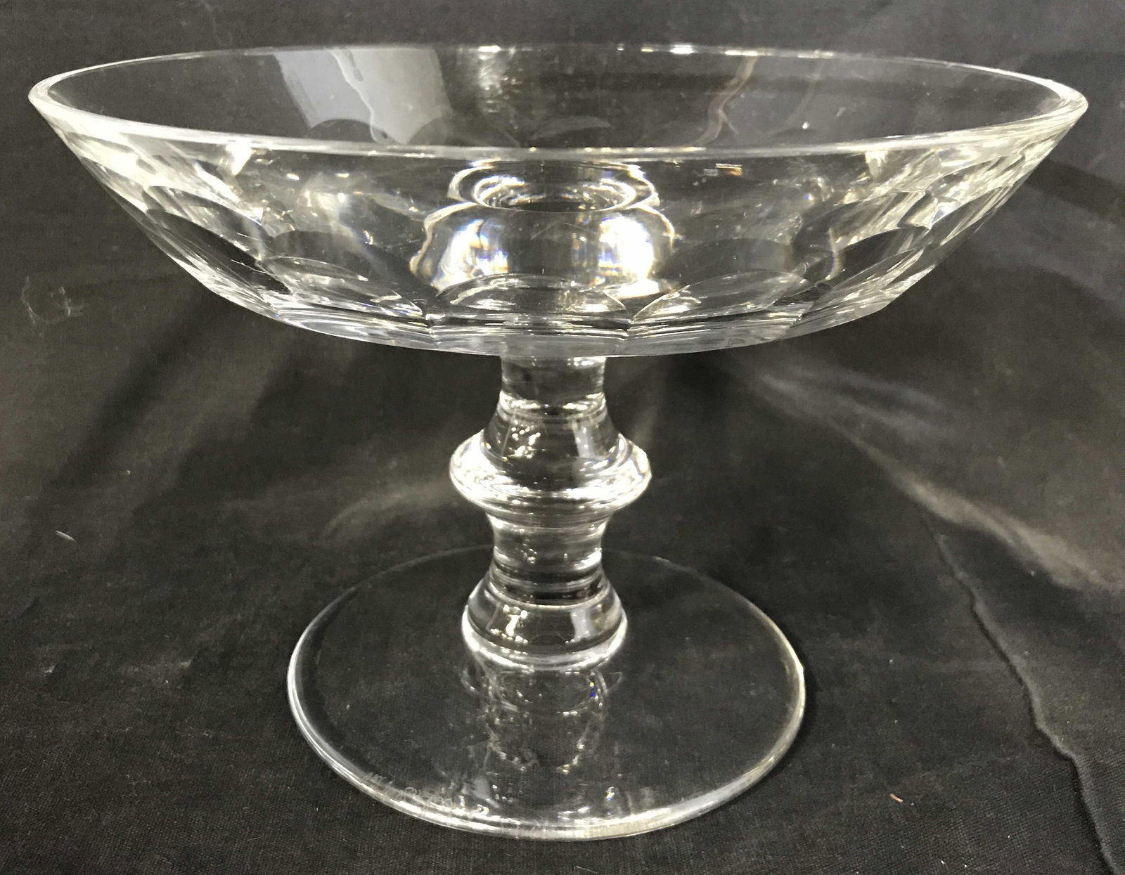 SIGNED VAL ST LAMBERT Cut Crystal Pedestal Bowl: Signed pedestal bowl, possibly vintage, possibly antique. Crafted from cut crystal. Underside is signed as VAL ST LAMBERT. Measures approx 5.5 inches H, 8.5 inches in diameter. Wear is consistent with