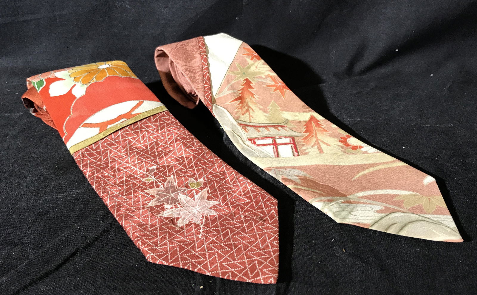 Pair LOUDIAN Signed Hand Painted Ties: Pair Loudian Signed Hand Painted Ties, signature to reverse of each reads Loudian, pattern to ties are floral with red and pink tones, ties each measures 60 inches at full length, in good condition, P