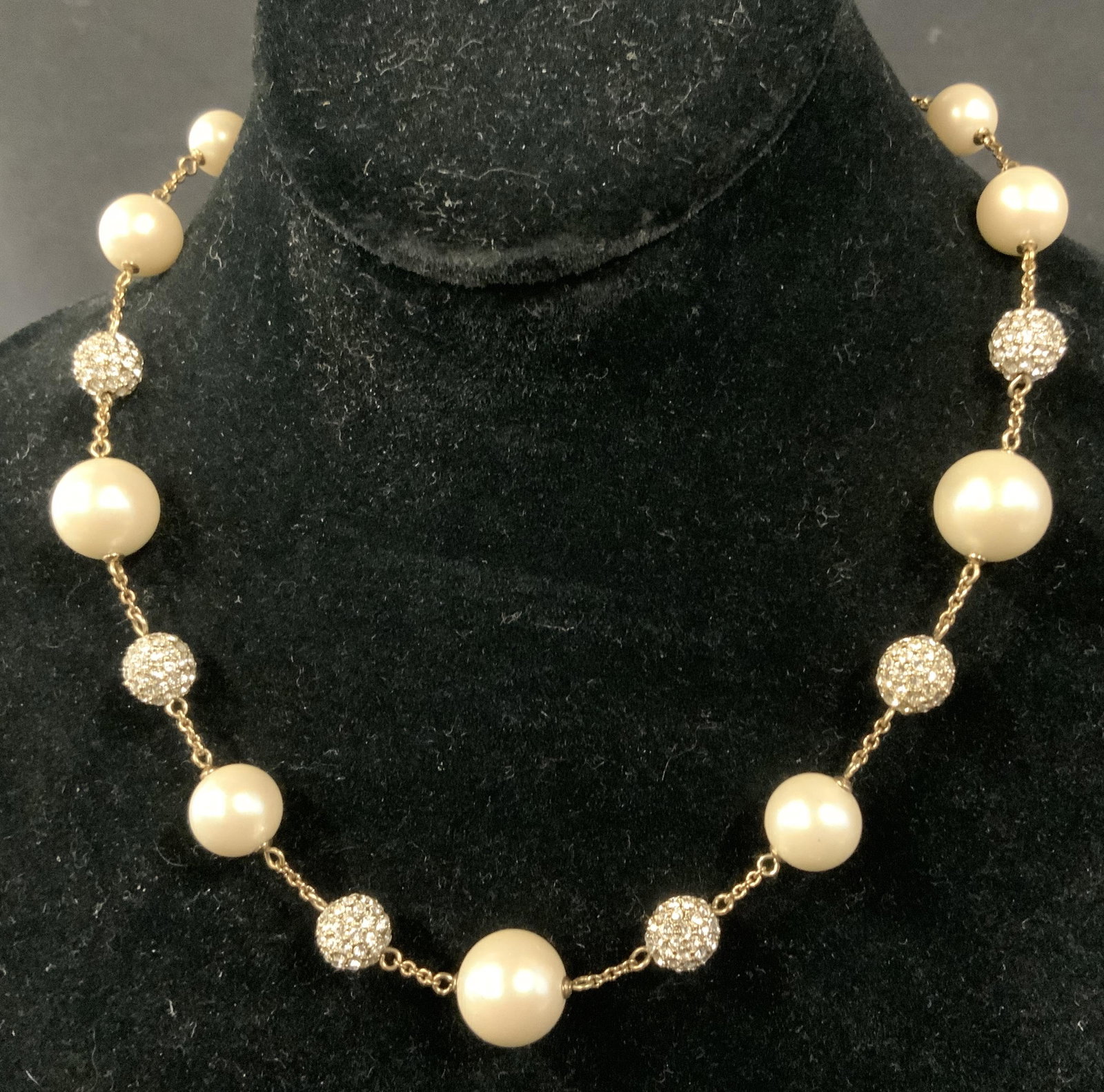 CARDIFF Pearlescent Beaded Necklace: Cardiff faux pearl necklace, inscription reads ‘Cardiff’, faux Pearl and round Pavey ball design, chain measures 18 1/4 inches, some surface wear but overall in good condition, Cardiff, faux Pearl