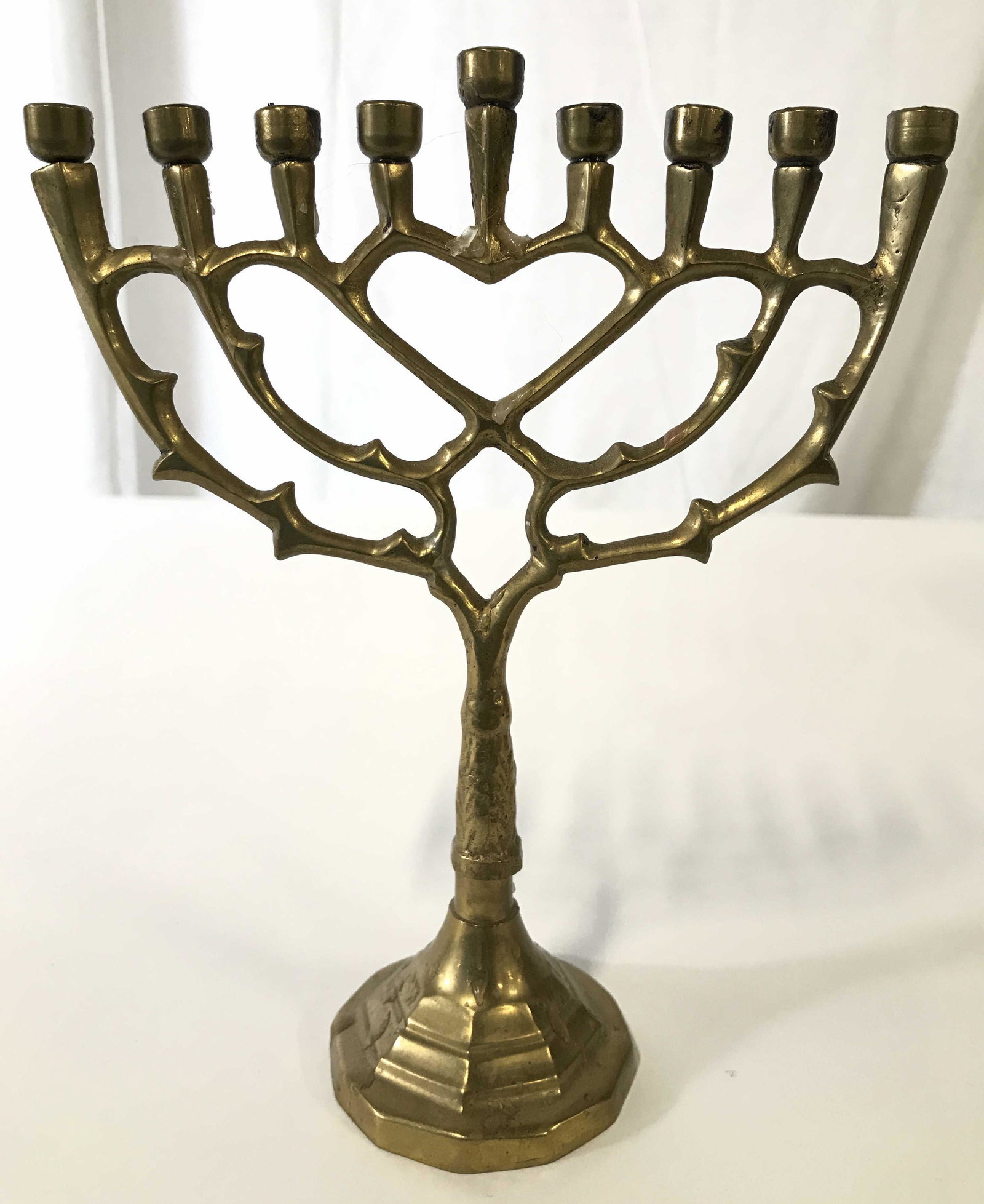 Vintage Gold Toned Brass Menorah: Menorah is gold toned and brass. Piece appears to be vintage. Measures approximately 8 inches tall 6.5 wide 2.5 inches deep. Menorah, Judaica menorah, Hebraica, Judaica, brass menorah, vintage menorah
