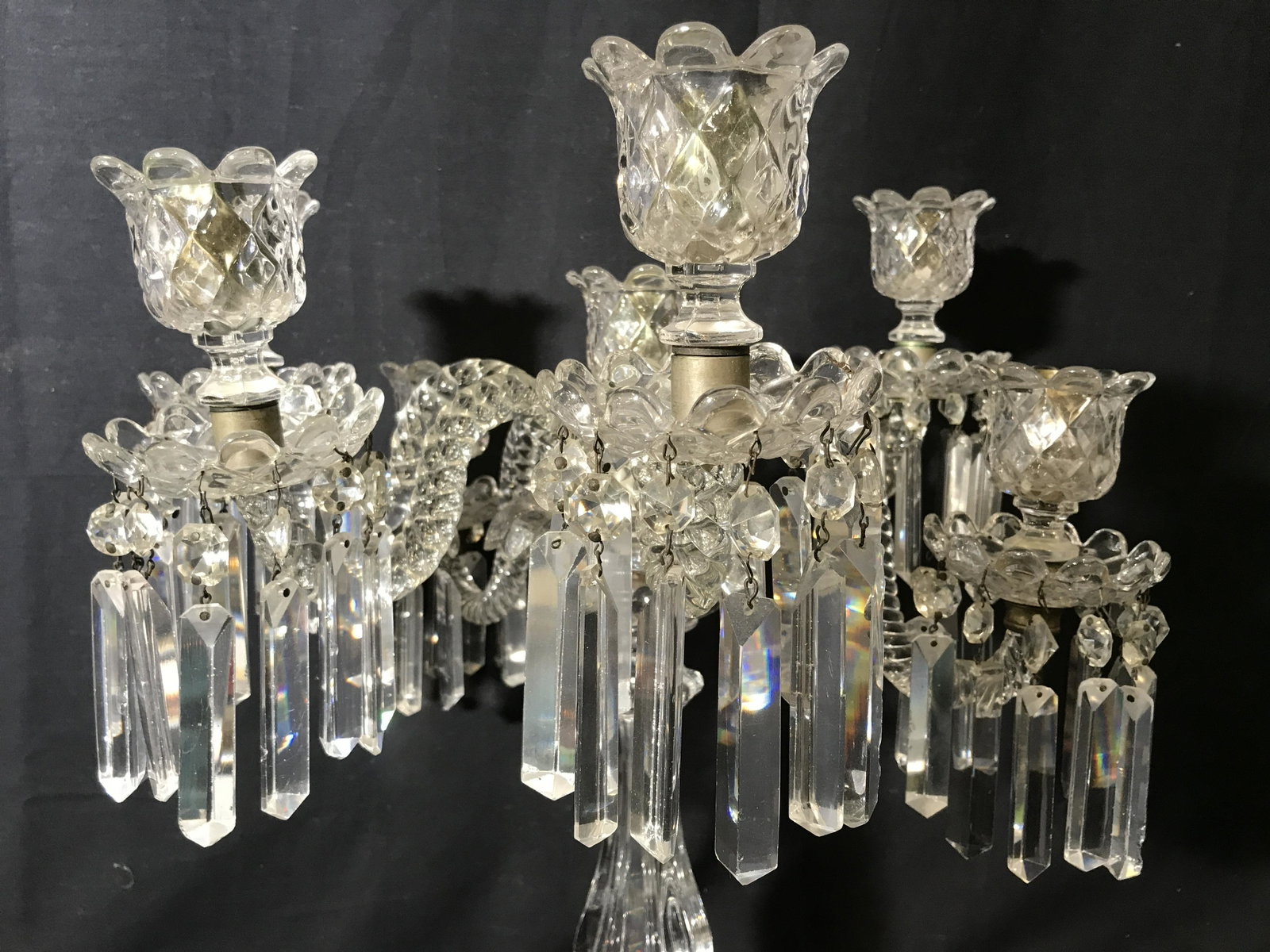 BACCARAT Art Glass Candelabra W Hanging Prisms: Baccarat Glass Candelabra, no apparent marks or stamps, baccarat bubbled glass to base, has 6 arms with a missing seventh, each of the arms is made of twisted rope style glass, each arm is placed at a