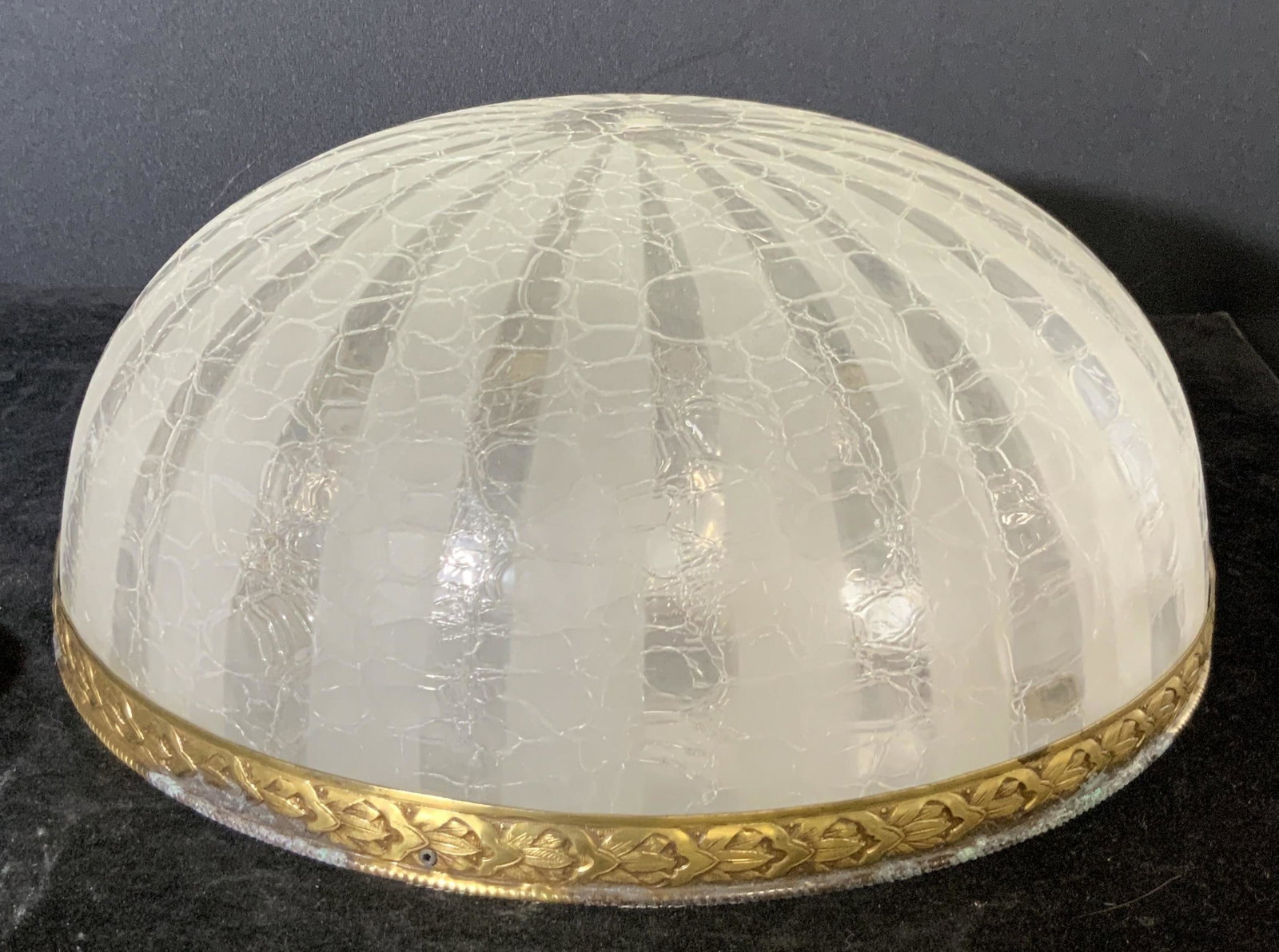 MOD DEP Spherical Glass Ceiling Light Fixture: Flush-mounted ceiling light fixture. Decorative crackle pattern on banded frosted & clear glass. Gold toned metal embossed trimming around base. Underside yellow textile material & wire. 4 pieces of m