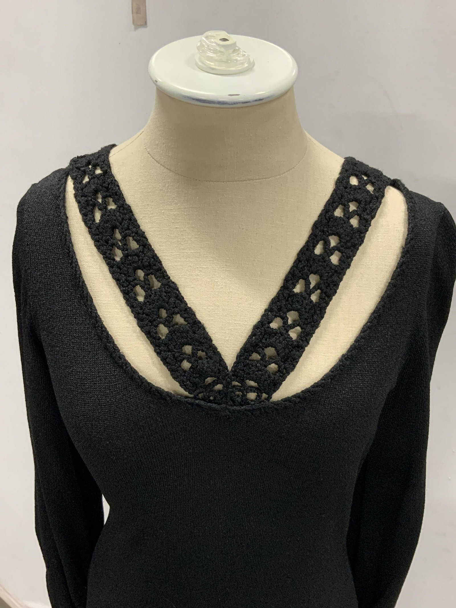 Vintage MISS DOLPHIN Long Black Crochet Dress: Long black dress, nearly floor length, with crochet accents. Composite fabric. Form fitting. Long black back zipper. Long sleeves, cinched. Size approx. Medium. Length approx. 58 in. Tags reads: MISS 