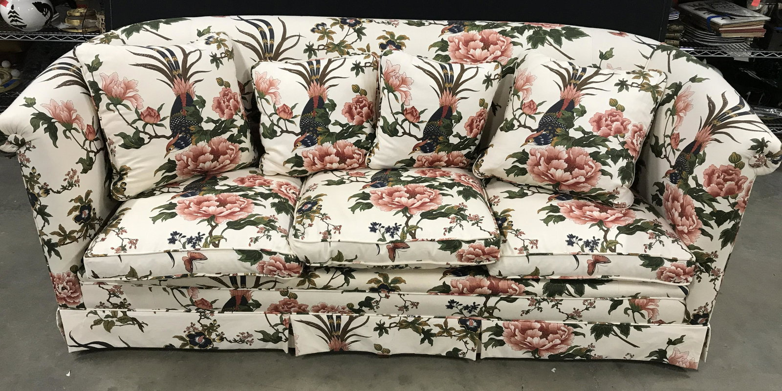 Upholstered Sofa W Throw Pillows: Upholstered skirted sofa. Upholstery depicts a bird perched on a branch. Upholstery is cream toned. Measures approx 33 inches H, 82 inches W, 30 Inches deep. Wear is consistent with age and use. Sofa,