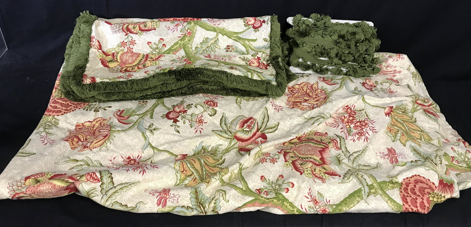 Set6 Bennison Style Coverlet Pillow Shams More: Includes a coverlet, three pillow shams, and two bolts of tassels fringes. Coverlet and shams are decorated in floral patterns, shams edges are decorated by olive green fringes. Two bolts of Naples Ta