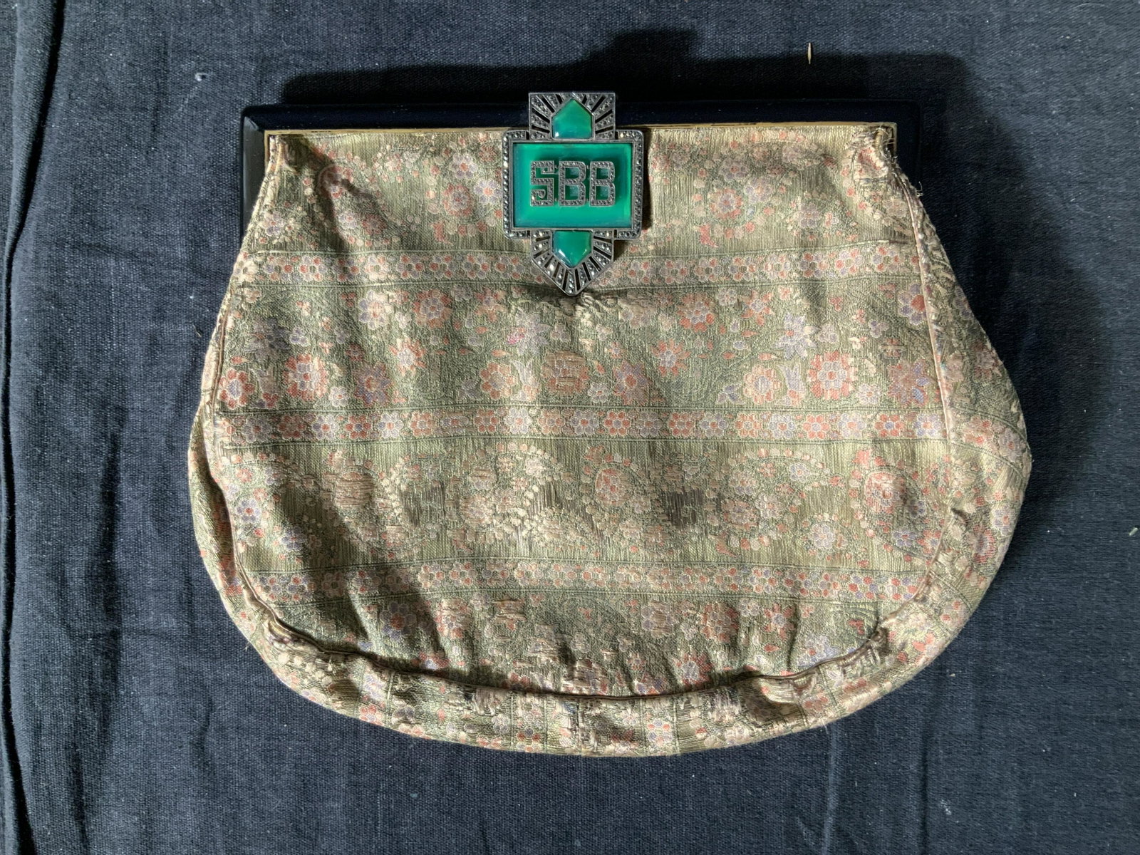 Vintage THORPE Women’s Clutch: Vintage THORPE WomenÂ’s Clutch, inscription to interior reads Â‘ThorpeÂ’, inscription to clasp reads Â‘SBBÂ’, floral fabric, measures 6 x 7 5/8 inches at widest point, wear consistent w