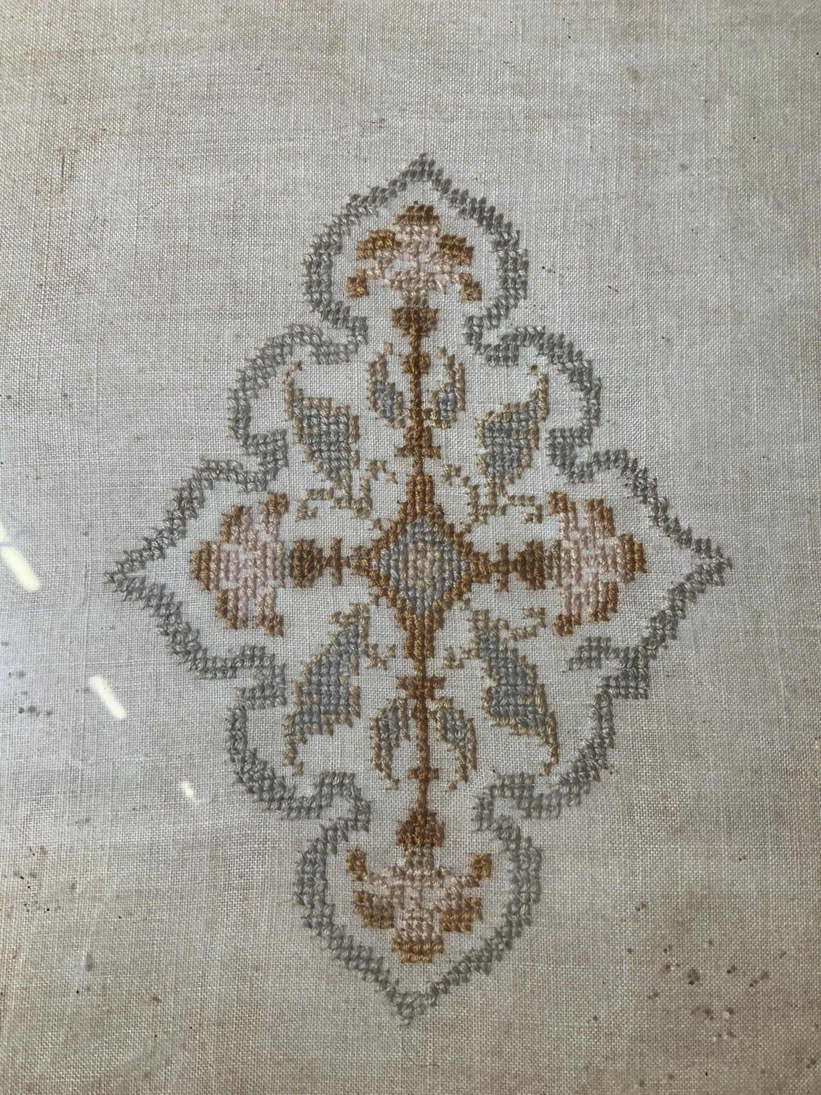 Antique Abstract Cross-stitch Artwork: Antique Abstract Cross stitch Artwork, no apparent inscriptions or signatures, subject abstract flowers, measures 14 1/4 x 12 1/4 inches, wooden frame, frame has wear and losses, some water damage to 