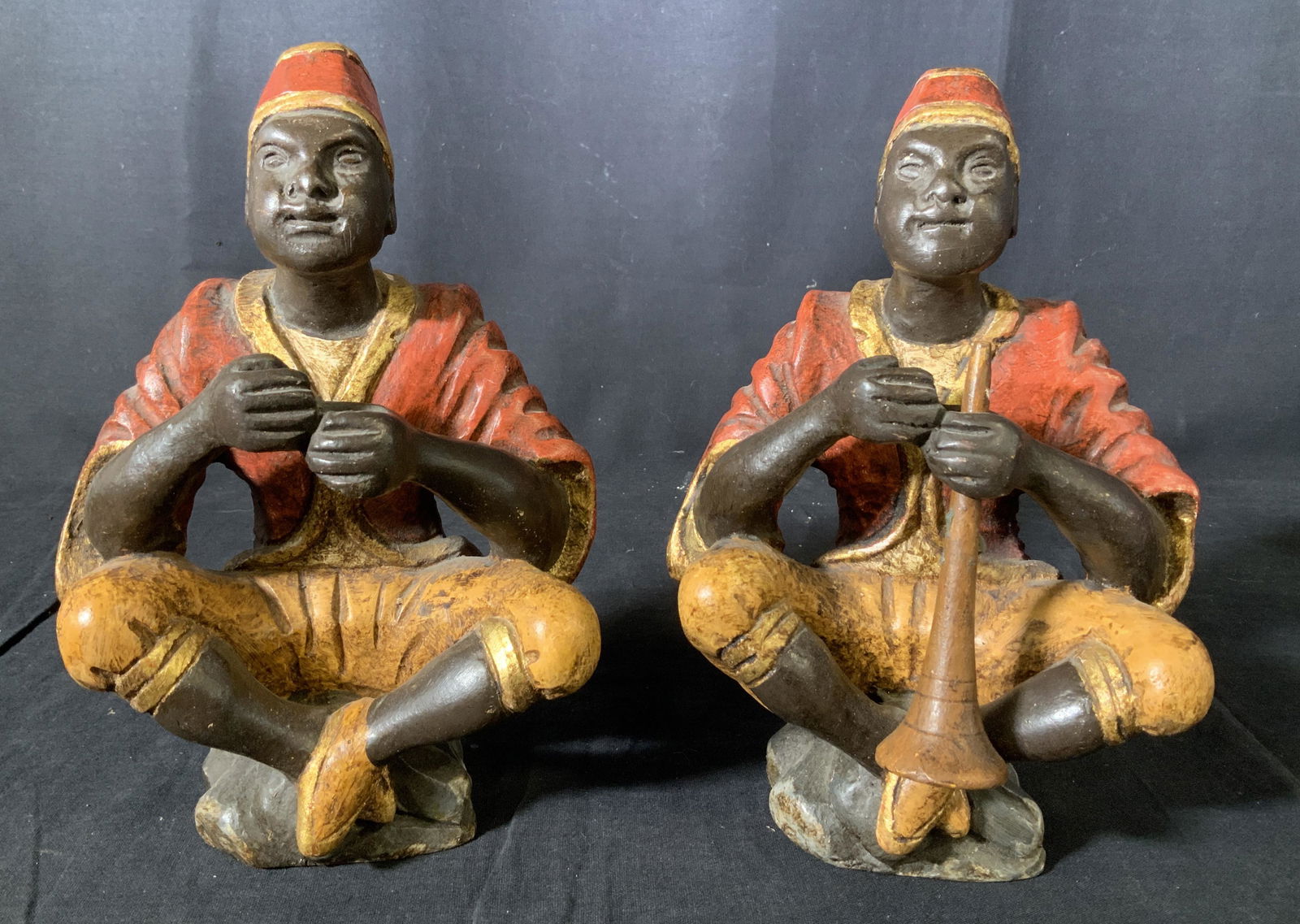 Pair Wooden Musician Sculptures: Pair Wooden Musician Sculptures, no apparent inscriptions or signatures, hand carved and painted, one figure measures 9 inches tall x 5 3/4 inches at widest point, other figure measures 8 3/4 inches t