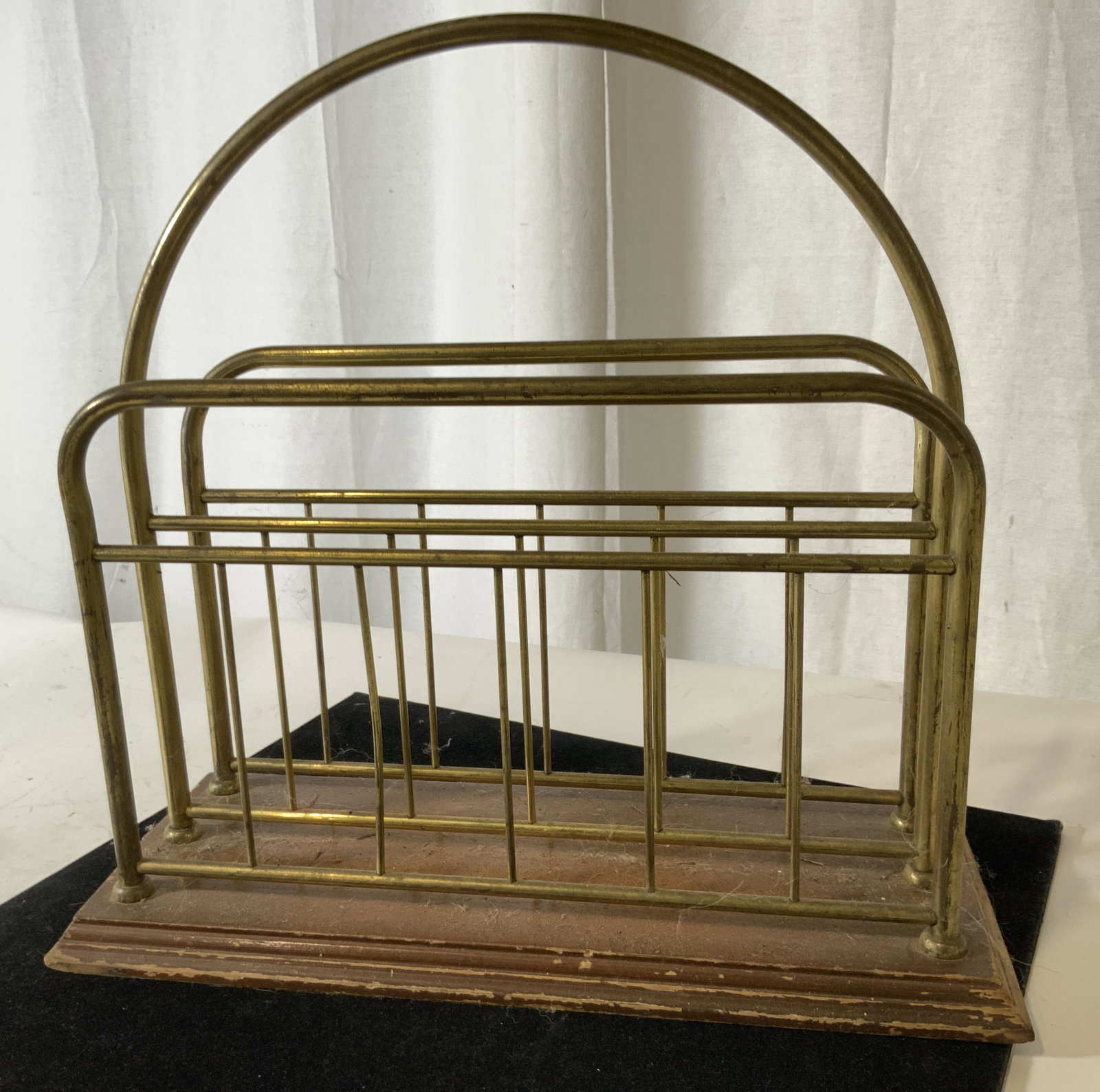 Vintage Brass and Wood Magazine Holder: Brass slats, wood base, green felt underside. Ht 14 in. Length 14.25 in. Width 5.75 in. Vintage magazine holder, up cycle, brass and wood magazine holder, office library accessory, Waiting room, bathr