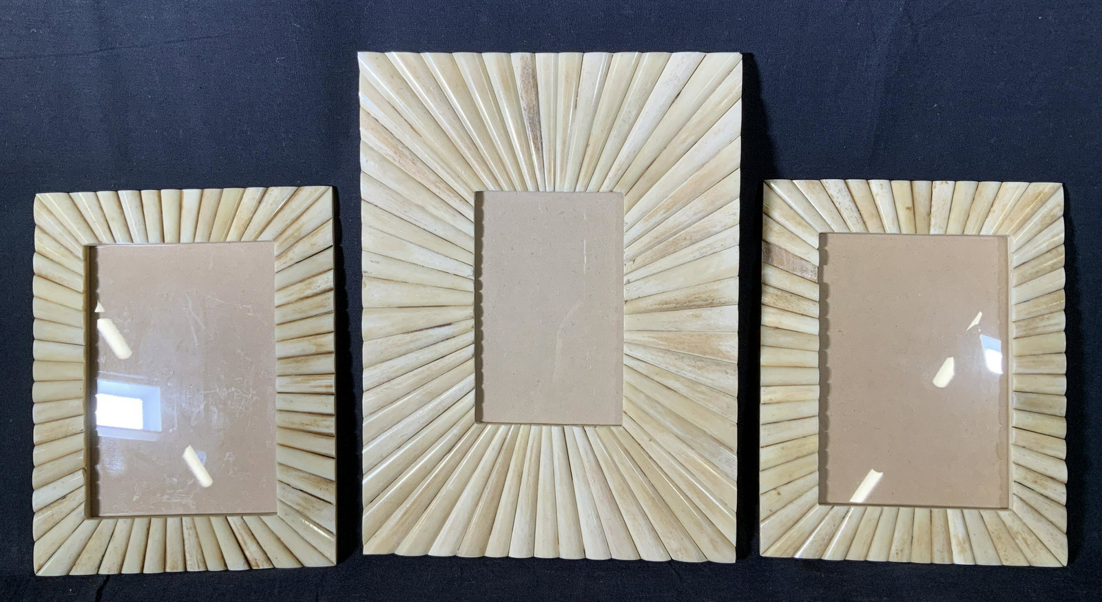 Set 3 Indian Mosaic Picture Frames: Set 3 Indian Picture Frames, label to one frame reads ‘Color: Beige Made in India’, comprised of composite material set in sunburst pattern, smaller frames measure 9 1/8 x 7 1/8 inches, larger fra