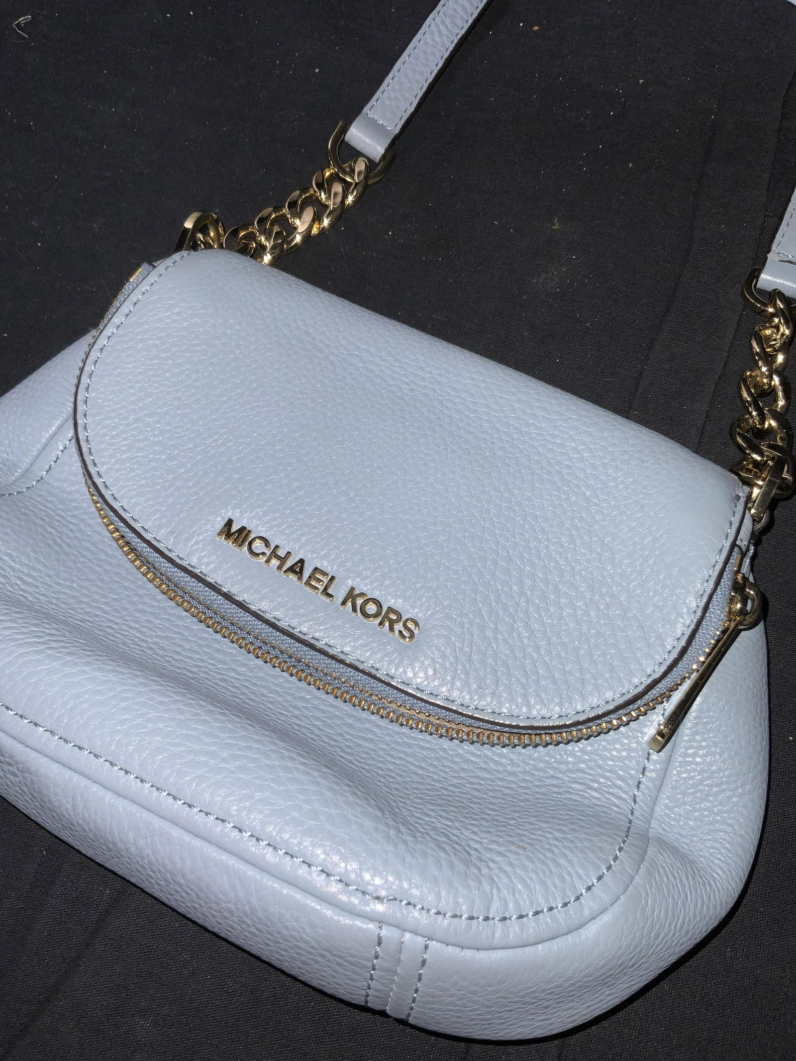 MICHAEL KORS Sky Blue Leather Purse: Signed Michael KORS Adjustable Strap shoulder/ cross shoulder bag. Pebbled leather, gold toned hardware, appeared not used or seldom used. Fold over flap with deep zippered compartment also snaps clos