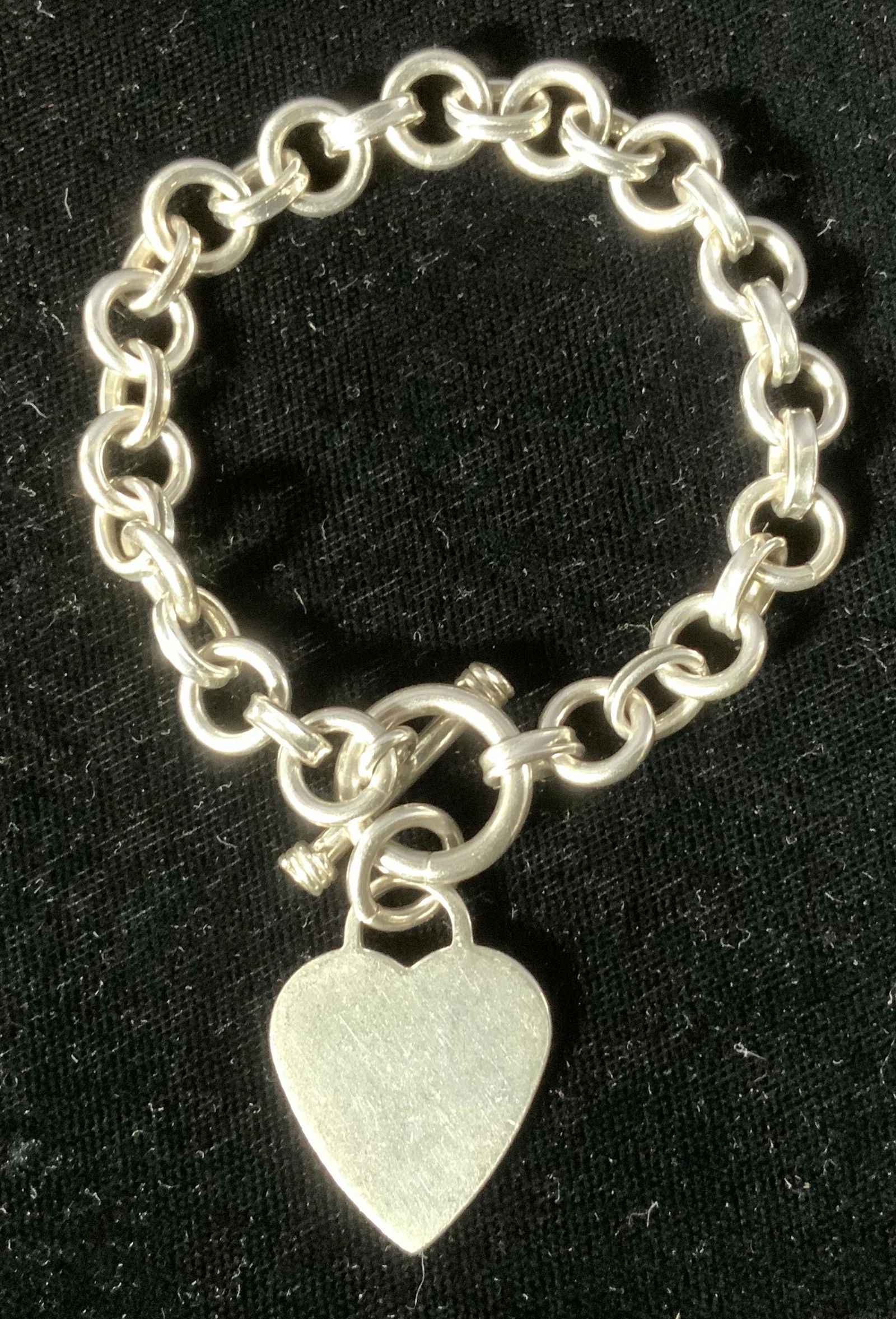 STERLING SILVER Heart Charm Bracelet: STERLING SILVER Heart Charm Bracelet, inscription to piece reads ‘875 P’, cable chain, Chain measures 7 inches in length, overall length measures 8 5/8 inches, some surface wear but overall in goo