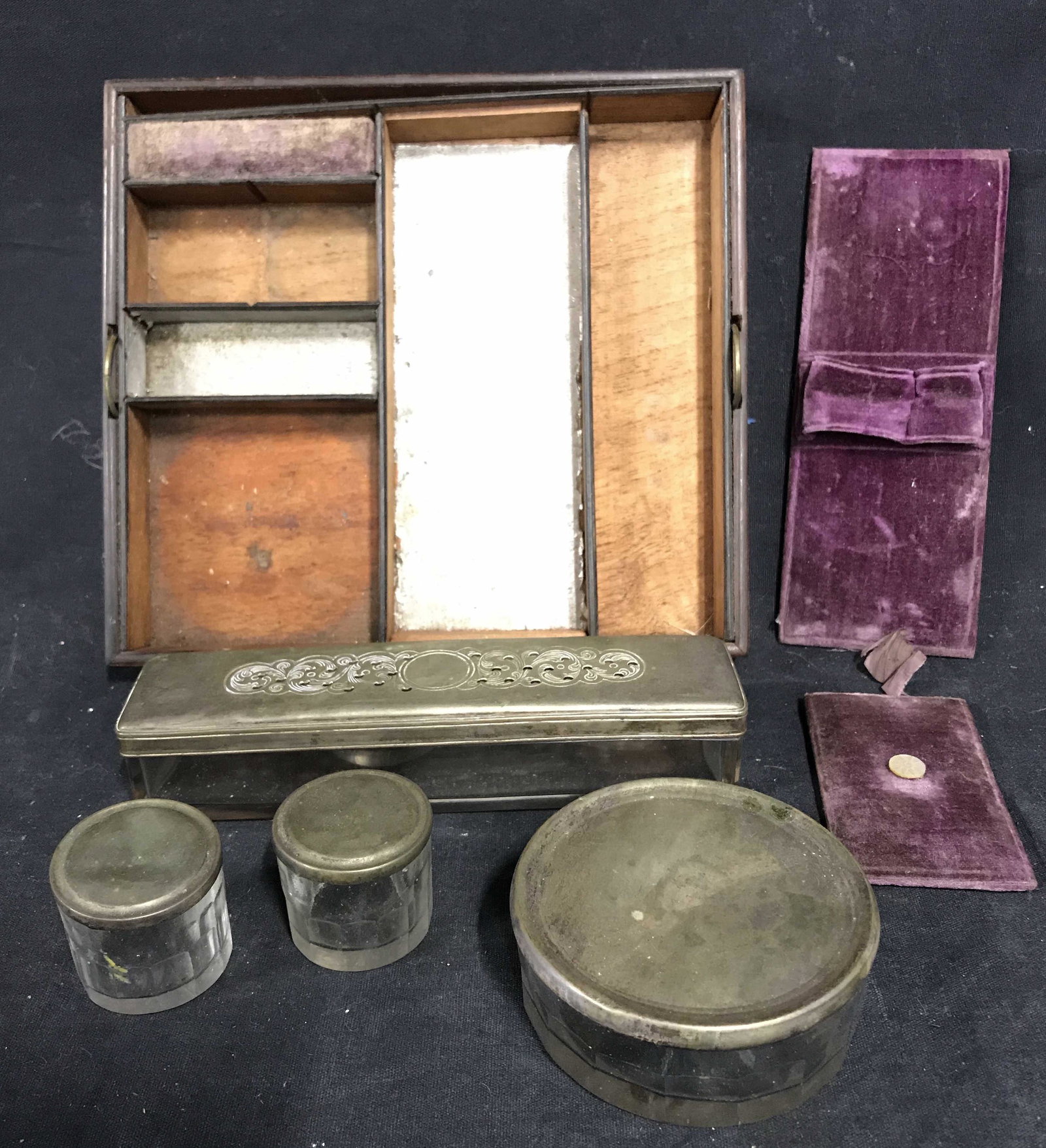 Antique Wooden Lap Desk & Accessories: Antique wooden lap desk, and several accessories. Includes inkwells, pen holders, and a wooden tray to secure the accessories. The inkwells are glass, lids are silver. Largest piece measures approx 3.