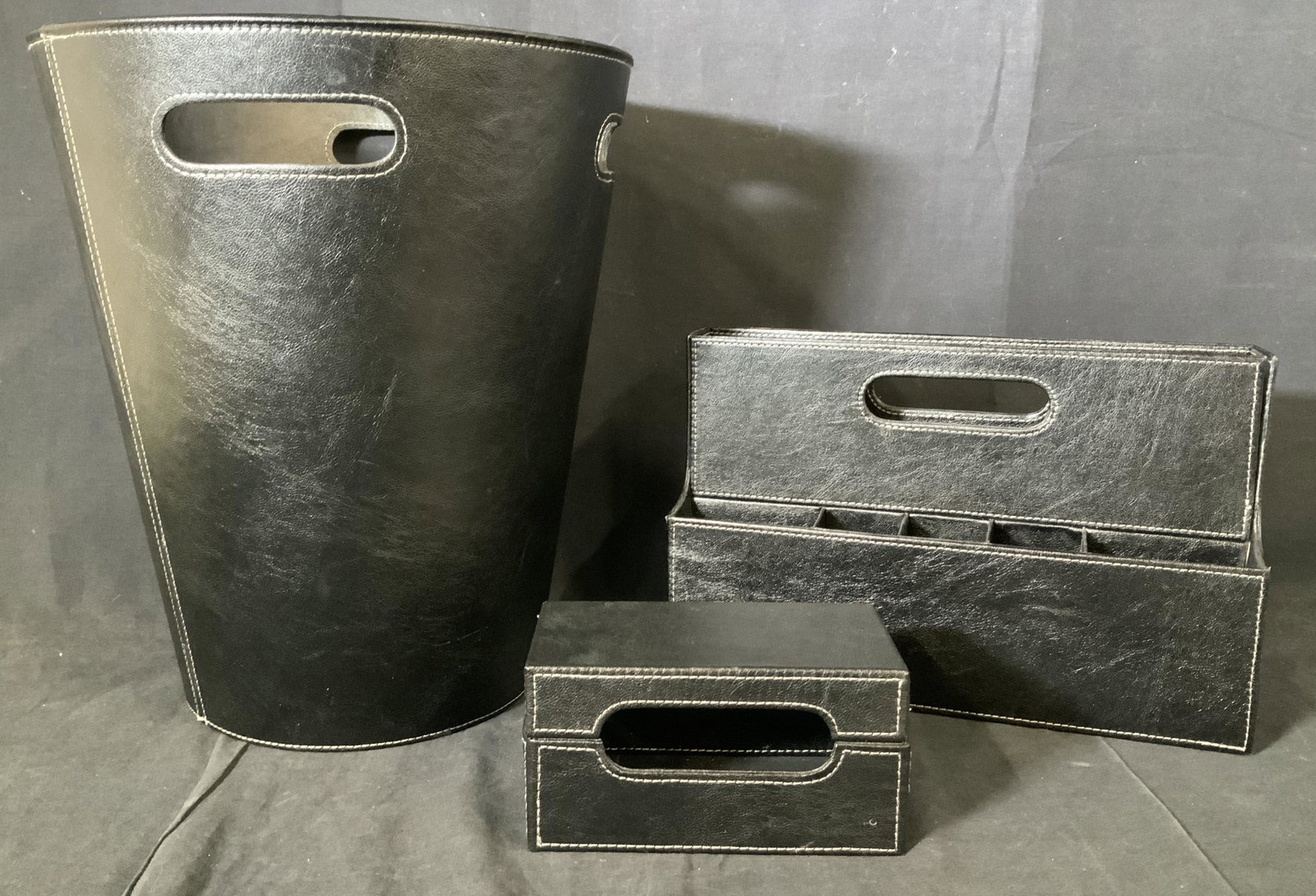 Set 3 Leather Desk Accessories: Set 3 Leather Desk Accessories, no apparent inscriptions or labels, smallest piece measures 3 1/4 x 6 1/2 inches at widest point, organizer measures 8 inches x 12 1/2 inches at widest point, trash can
