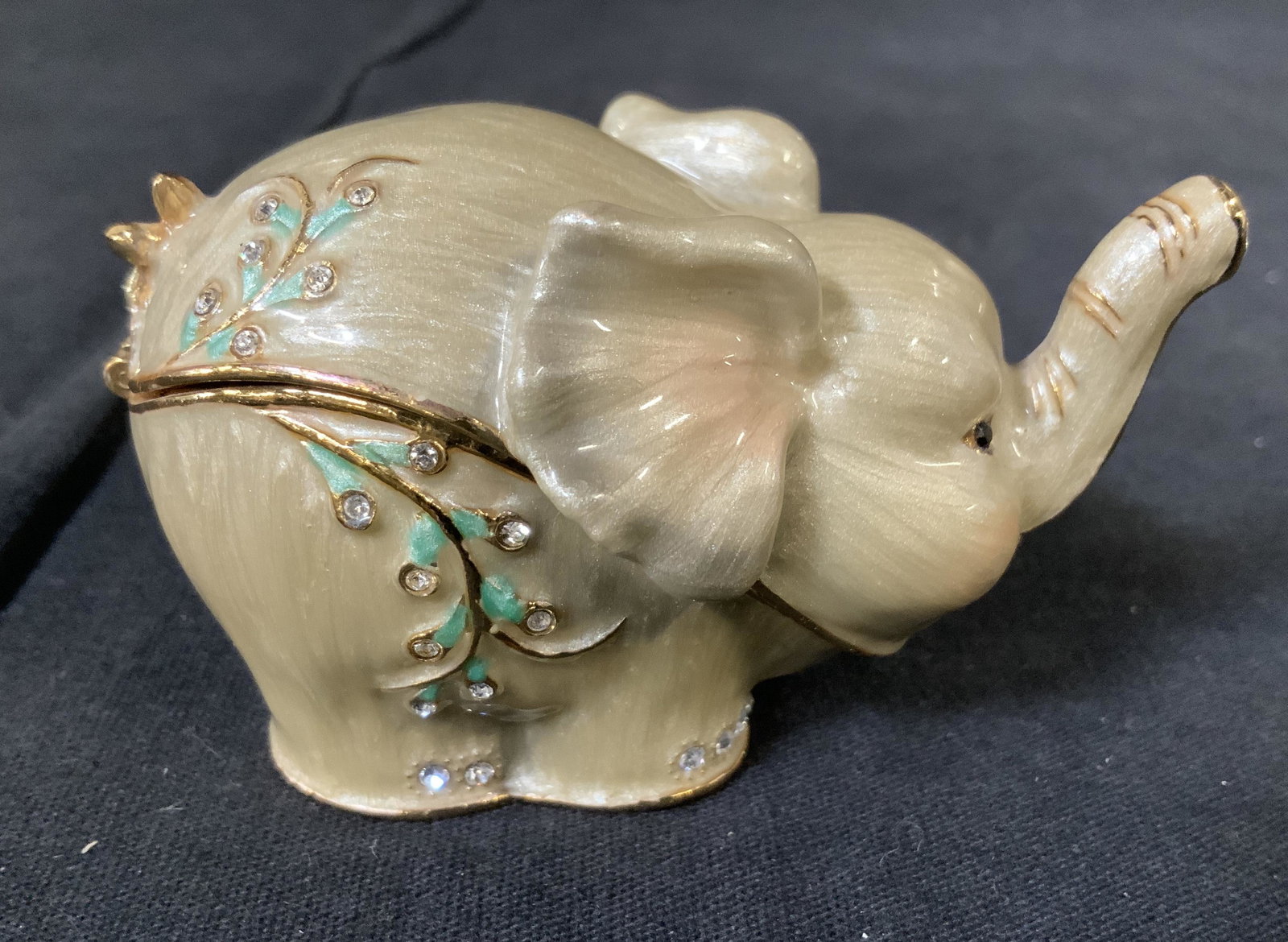 Trademarked Enamel Elephant Pill Box: Trademarked Enamel Elephant Pill Box, inscription to interior reads ‘K’, label to base reads ‘62346’, bejeweled design, measures 1 3/4 inches x 3 inches at widest point, in good condition, Ena