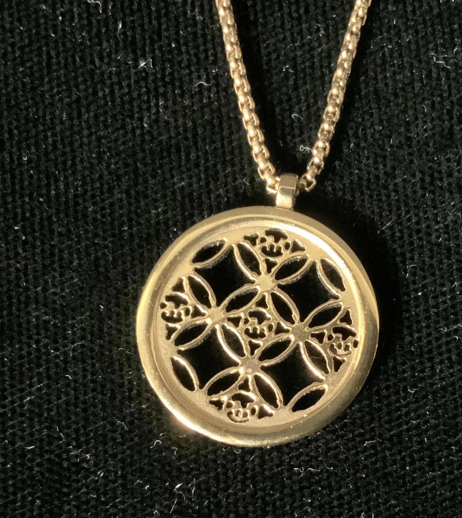 MICHAEL KORS Pendant Necklace: MICHAEL KORS Pendant Necklace, inscription reads ‘Michael Kors’ and ‘MK’, rose gold toned metal, pendant measures 3/4 inches in diameter, chain measures 15 7/8 inches long, some surface wear b