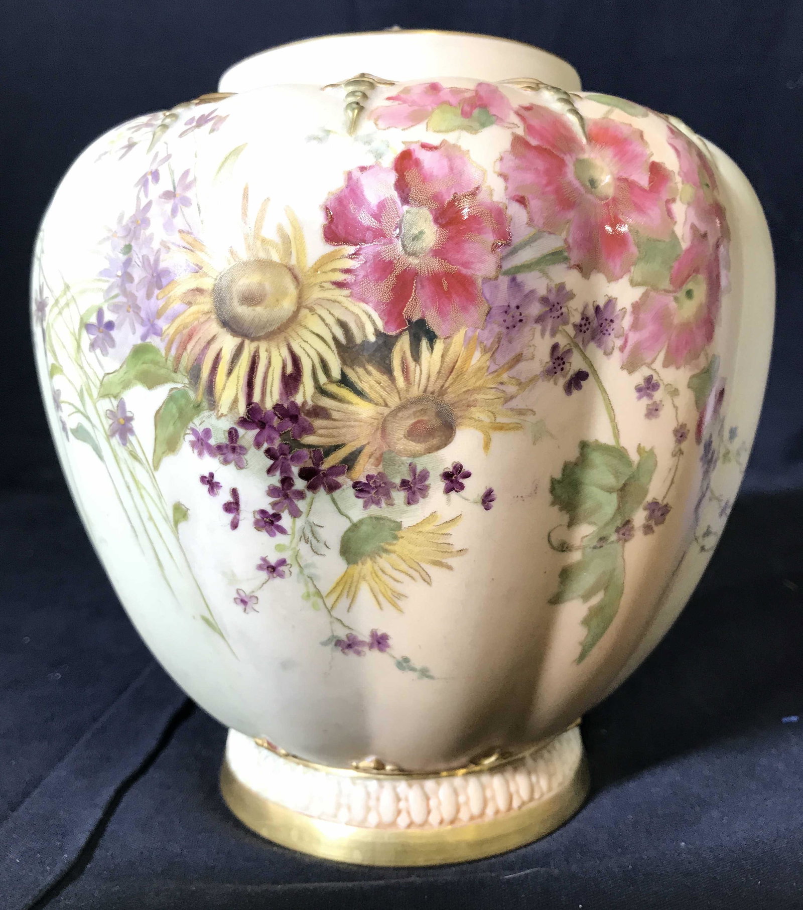 ROYAL WORCESTER ENGLAND Porcelain Jar: Underside is marked ROYAL WORCESTER ENGLAND. PIECE is porcelain. Contains multi toned floral vine and leaf detail. Piece is possibly hand painted. Jar includes lid. Piece measures approximately 8 inch