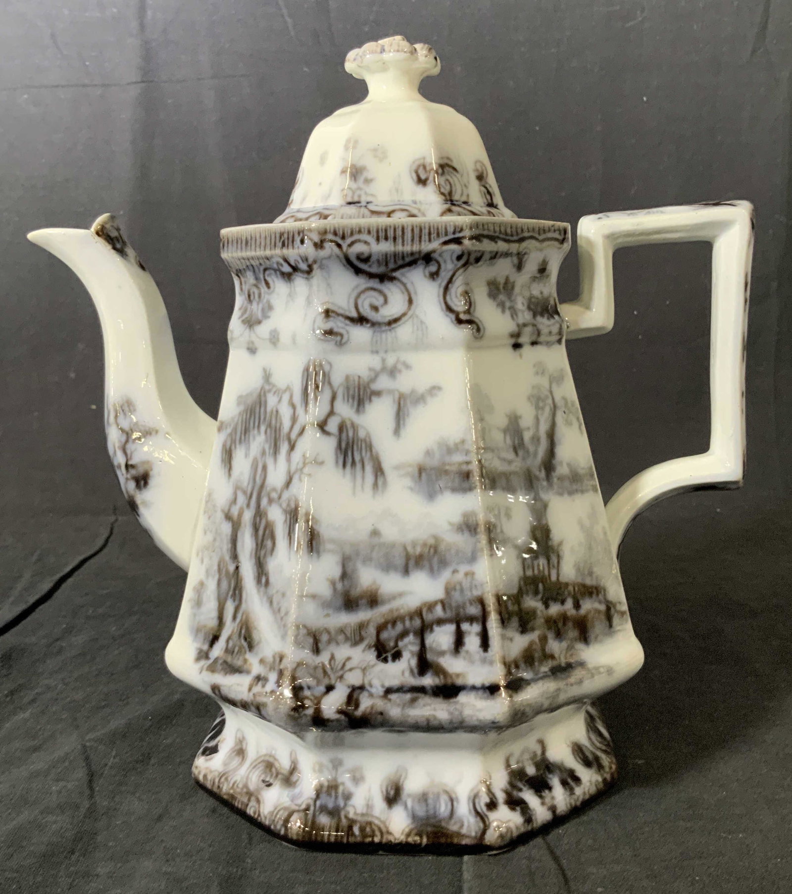 Antique MELLOR VENABLES & CO Ironstone Teapot: Antique MELLOR VENABLES & CO Ironstone China Teapot, inscription to base reads ‘Ironstone China Mellow Venables and Co 15 Ironstone’, design features people crossing a bridge, measures 9 1/2 x 9 i