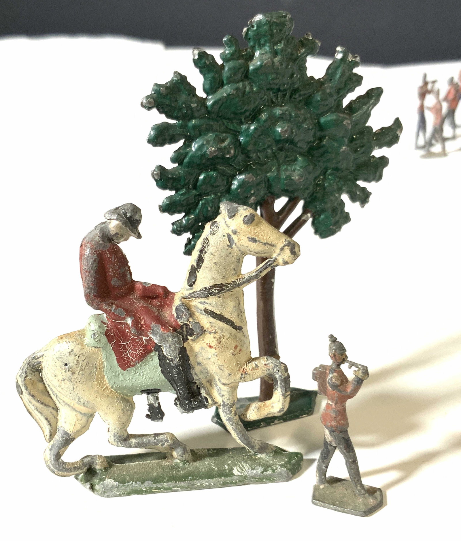 Set 19 Collect. Antique Painted Metal Miniatures: 19 miniatures made of metal and painted. Set includes trees, horses, bears, deer, Buffalo, horse riders, fox hunters, and more. Colors include reds, greens, browns, and white. Sizes vary. Approx. heig