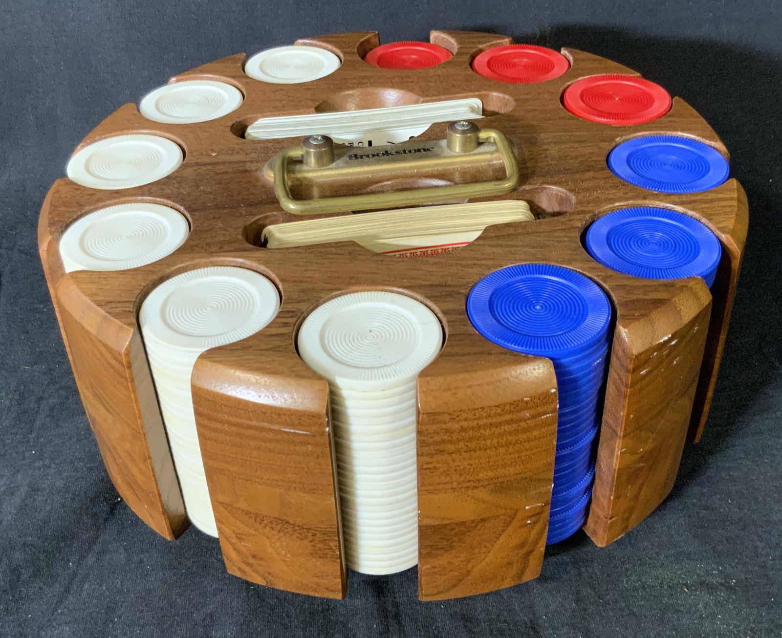 BROOKSTONE Wooden Poker Chip Caddy: BROOKSTONE Revolving Wooden Poker Chip Caddy, inscription to piece reads ‘Brookstone’, Measures 4 3/8 inches tall x 9 1/2 inches in diameter, 107 playing cards included as well as two informationa