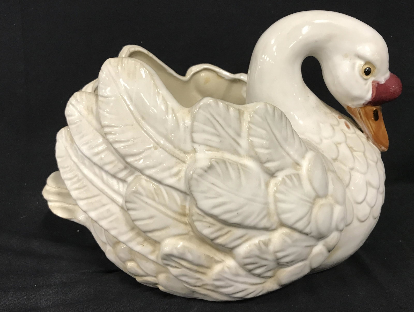 Glazed Ceramic Swan Vessel: Glazed ceramic swan vessel. Measures approx 8.5 inches H, and 14 inches W. Wear is consistent with age and use. Swan, duck, goose, vessel, vase, planter, home decor, vintage decor, vintage flower pot.