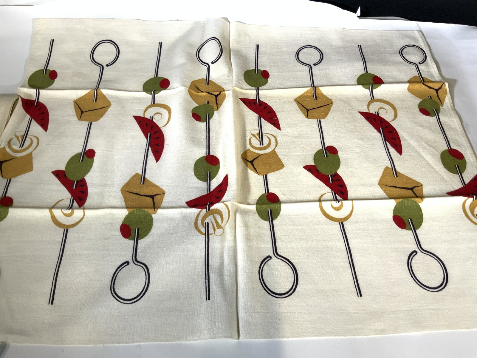 Collectible MARTEX Grilling Motif Tea Towel Linen: Labeled MARTEX Dry Me Dry. A three fiber towel combo on linen, cotton and rayon, depicting barbecue skewers with pieces of cheese, olives, watermelon, & mushroom. Like new, no fabric issues. 27.5 x 21