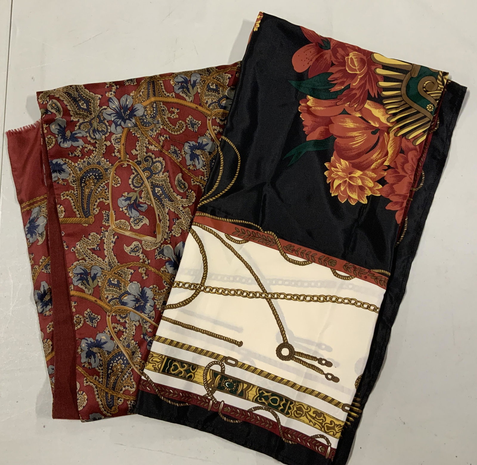 Lot 2 Geoffrey Beene & JG Hook Scarves: Lot 2 Geoffrey Beene & JG Hook Scarves, inscription to scarf reads ‘JG Hook’, label to other scarf reads ‘Geoffrey Beene 100% pure silk 100% wool reversible Hand Made in Italy Dry Clean Only RN 