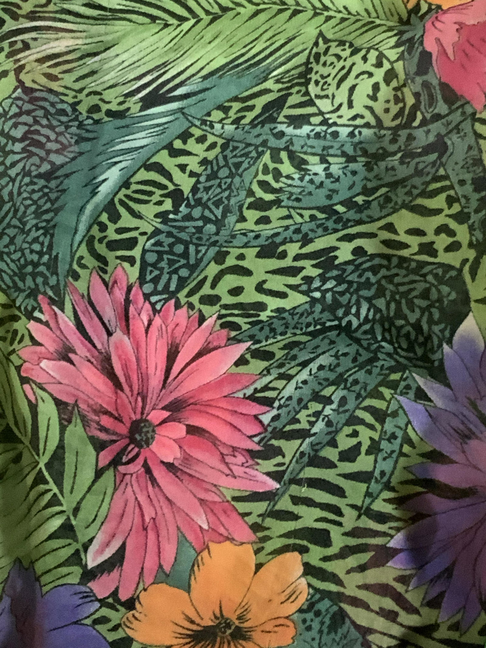 Lot 4 Colorful Patterned Green Fashion Scarves: 4 green colorful scarves with various fabric compositions. Scarves are square or rectangular in shape. Various green hues and patterns adorn each scarf. Some have floral and horse motifs / patterns as