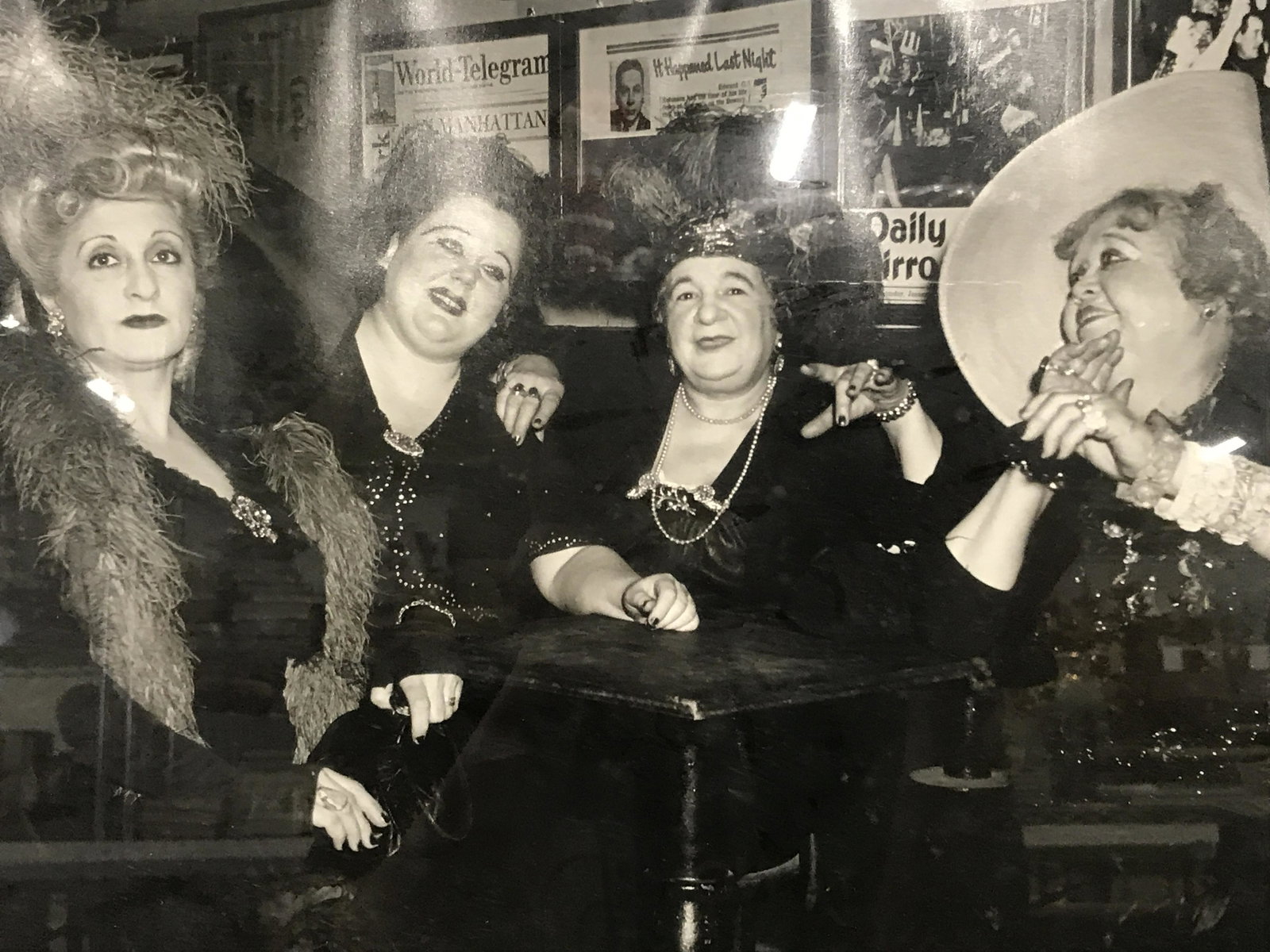 ERIKA STONE Signed Black & White Photo: Erika Stone signed black and white photo, signature to the lower right corner reads ‘Erika Stone’, subject a black and white photo of 4 women in 1920’s fashion seared in what appears to be a bar