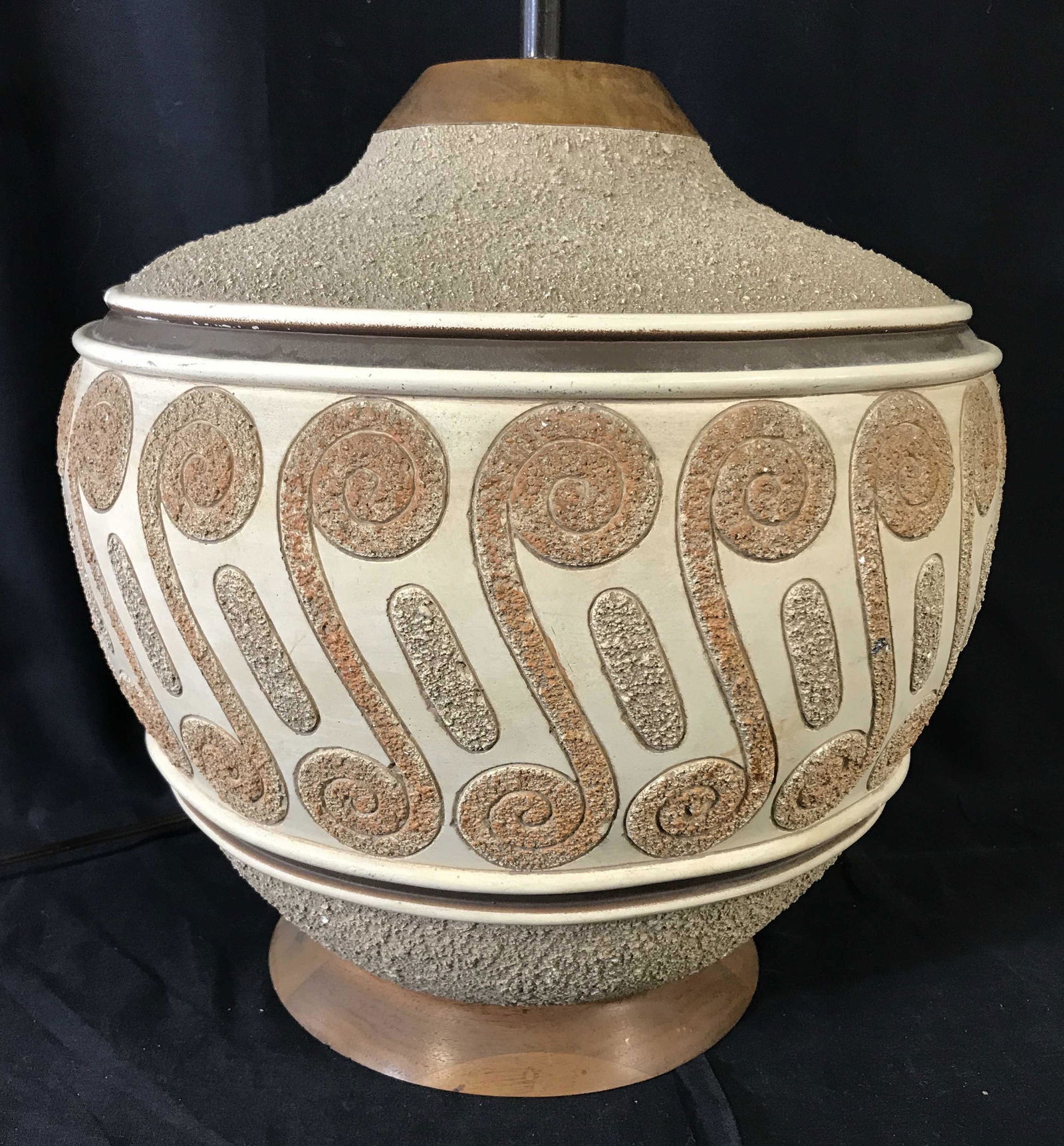 MCM Vintage Table Top Lamp: Vintage table top lamp, circa 1960. Beige toned, crafted from wood and ceramic. Textured stone composite patterns decorate body of lamp. Measures approx 28.5 inches H and 13 inches Wear is consistent