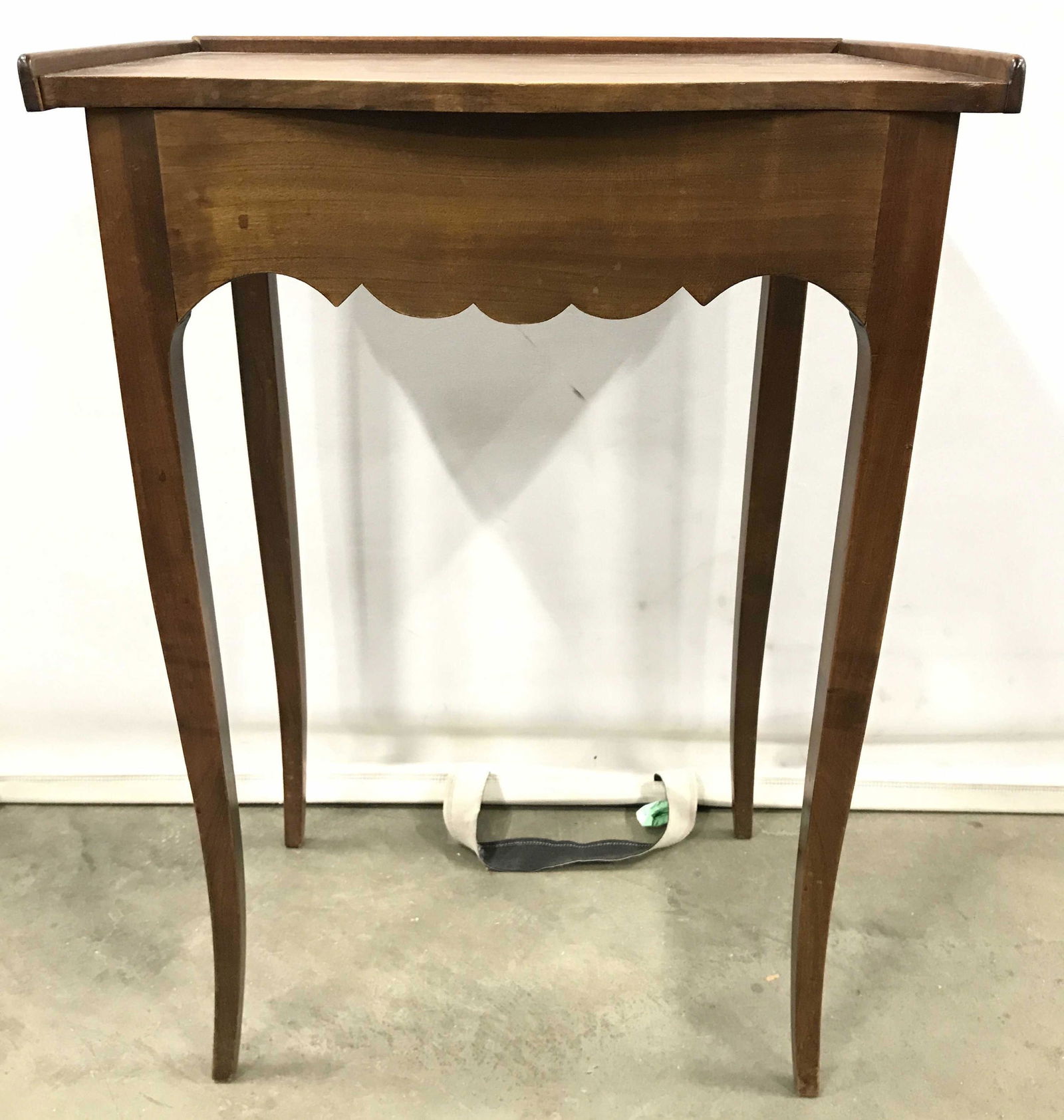 MM ARMSTRONG Country French Wooden Side Table: Underside of side table has tag which reads MM ARMSTRONG. Side table is vintage possibly antique. Piece appears to Possibly be hand crafted. Side table has carved wooden detail under tabletop. Table h
