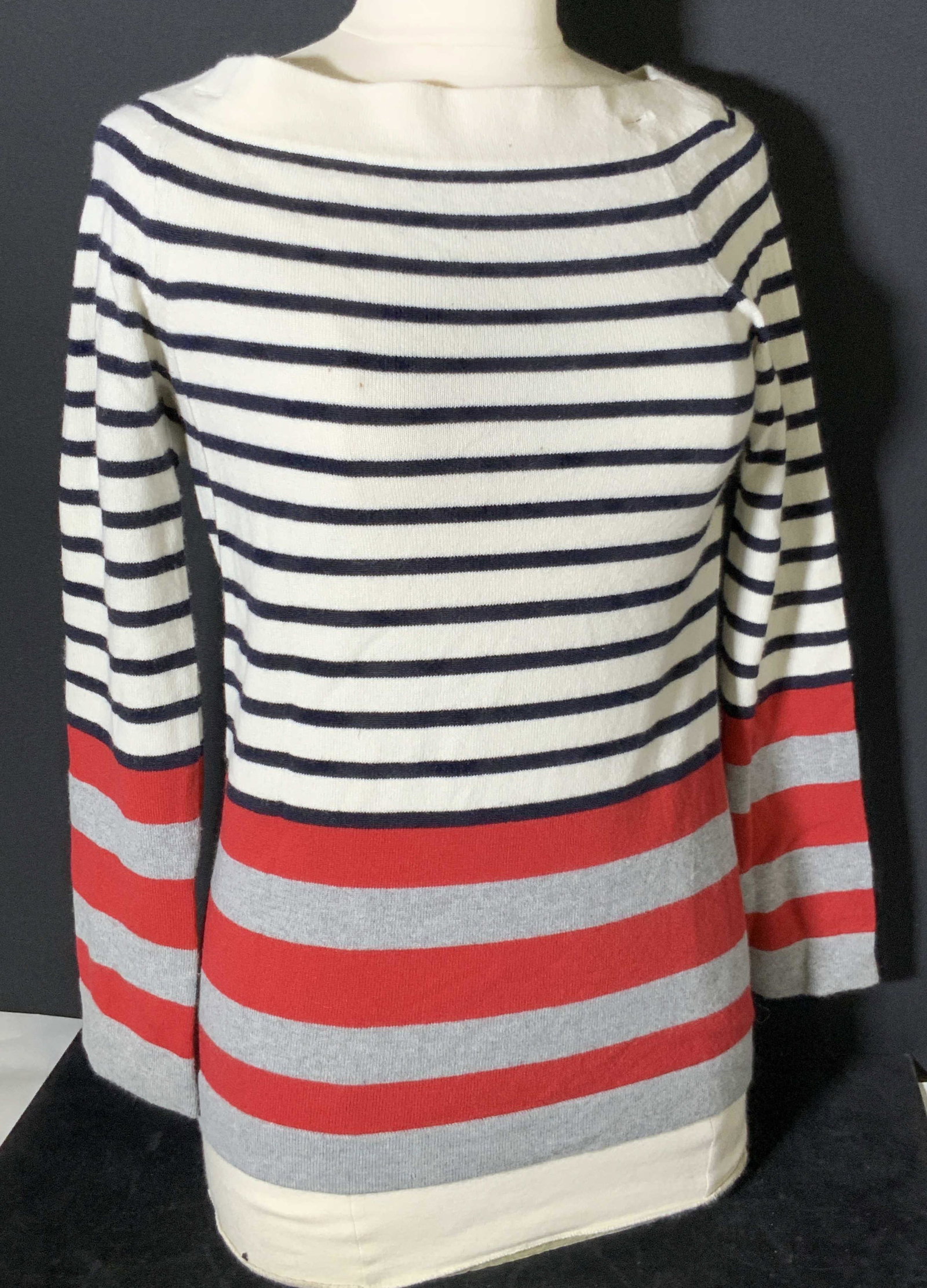 CHANEL Striped Red & White Sweater: White cashmere sweater with red, black, and gray stripes. Tag reads: Chanel, Made in Italy, R8623, 38. 100% Cashmere. Approx. Small/Medium Luxury ladies wearables, luxury sweater, Chanel sweater, luxu