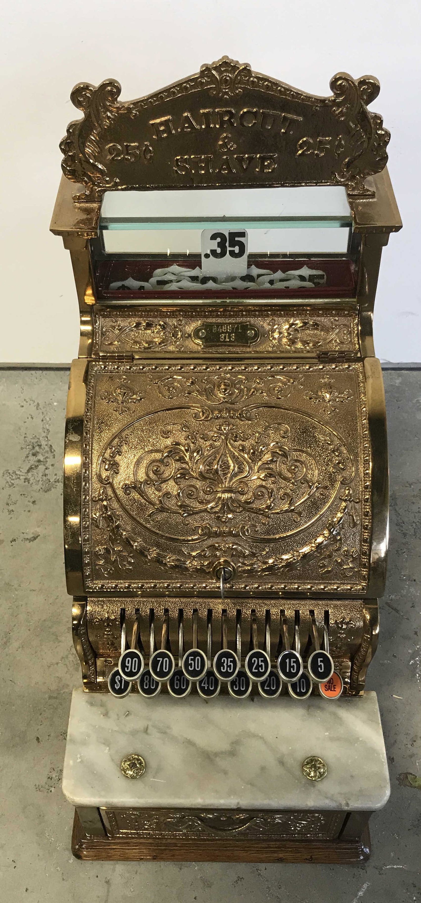 Antique Metal Cash Register: Vintage possibly Antique metal cash register, comes with four keys for various parts of the register, made of a gold toned metal possibly bronze, draw to bottom of register unable to open, heavy weigh