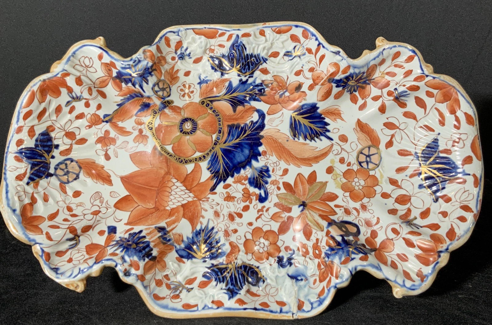 MASON’S Antique Ironstone Water Lily Compote: Early 19th century Mason’s Ironstone Water Lily patterned compote plate. Possibly Imari ware. Hand painted Colors throughout are white, saffron, cobalt blue, and gilt lining. Underside features same