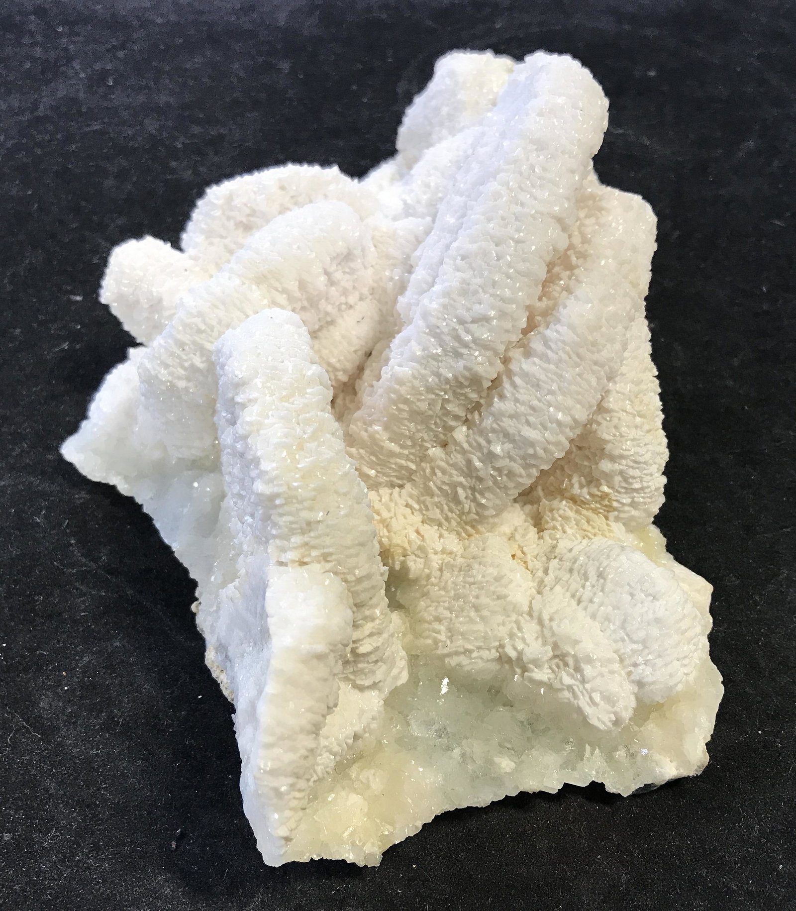 Peruvian Mined Dolomite Pseudomorph after Calcite: Peruvian mined dolomite pseudomorph after calcite geode, mined from the Ruara mine in Peru, unique in its own shape and size, naturally grown in a calcified style, stone is a pale white color with yel