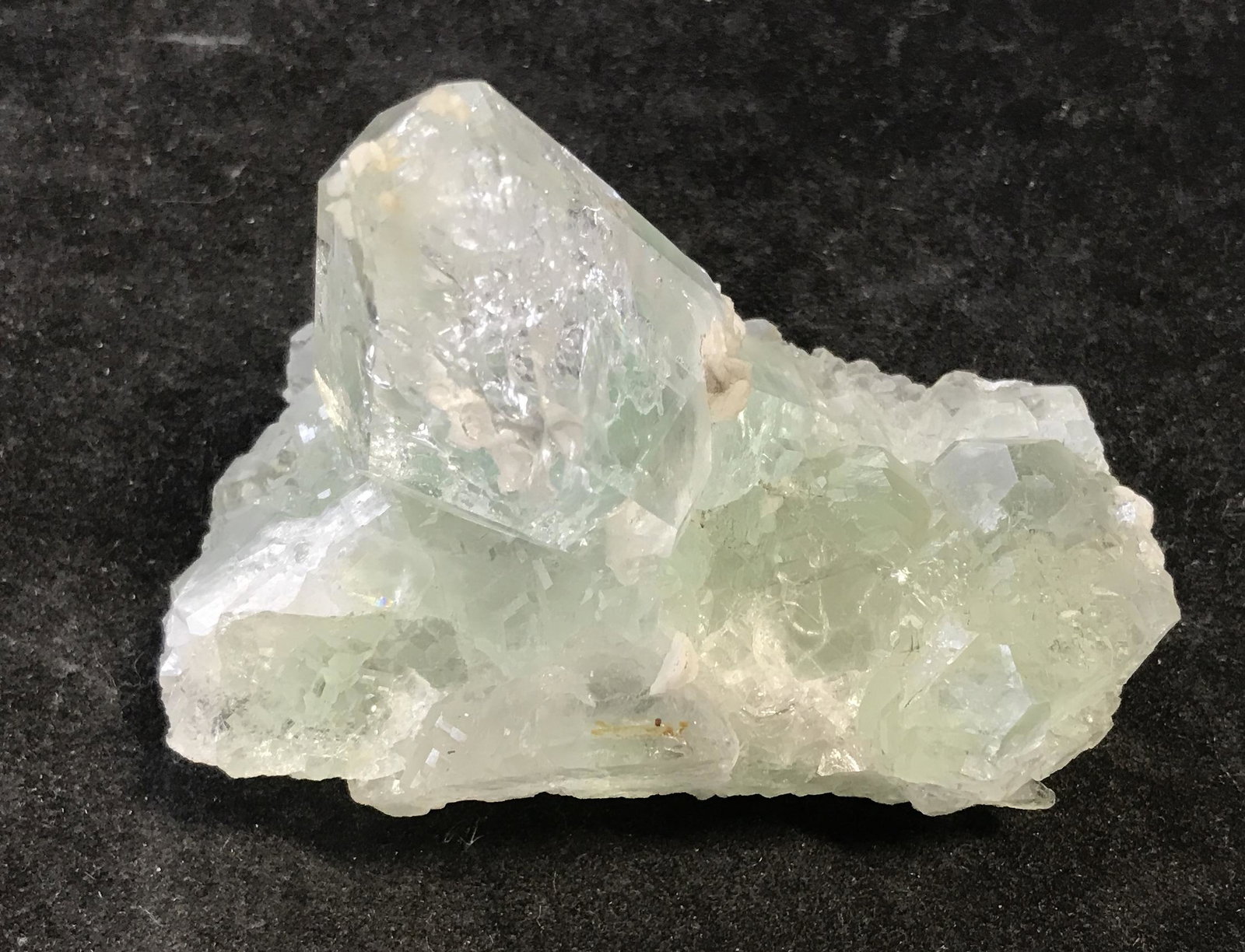 Peruvian Mined Fluorite Crystal Geode: Peruvian Mined Fuorite Crystal Geode, mined from the Huanzala mine in Peru, unique in its own shape and size, naturally grown in a Cubic crystal style, stone gives off a pale green color with clear as