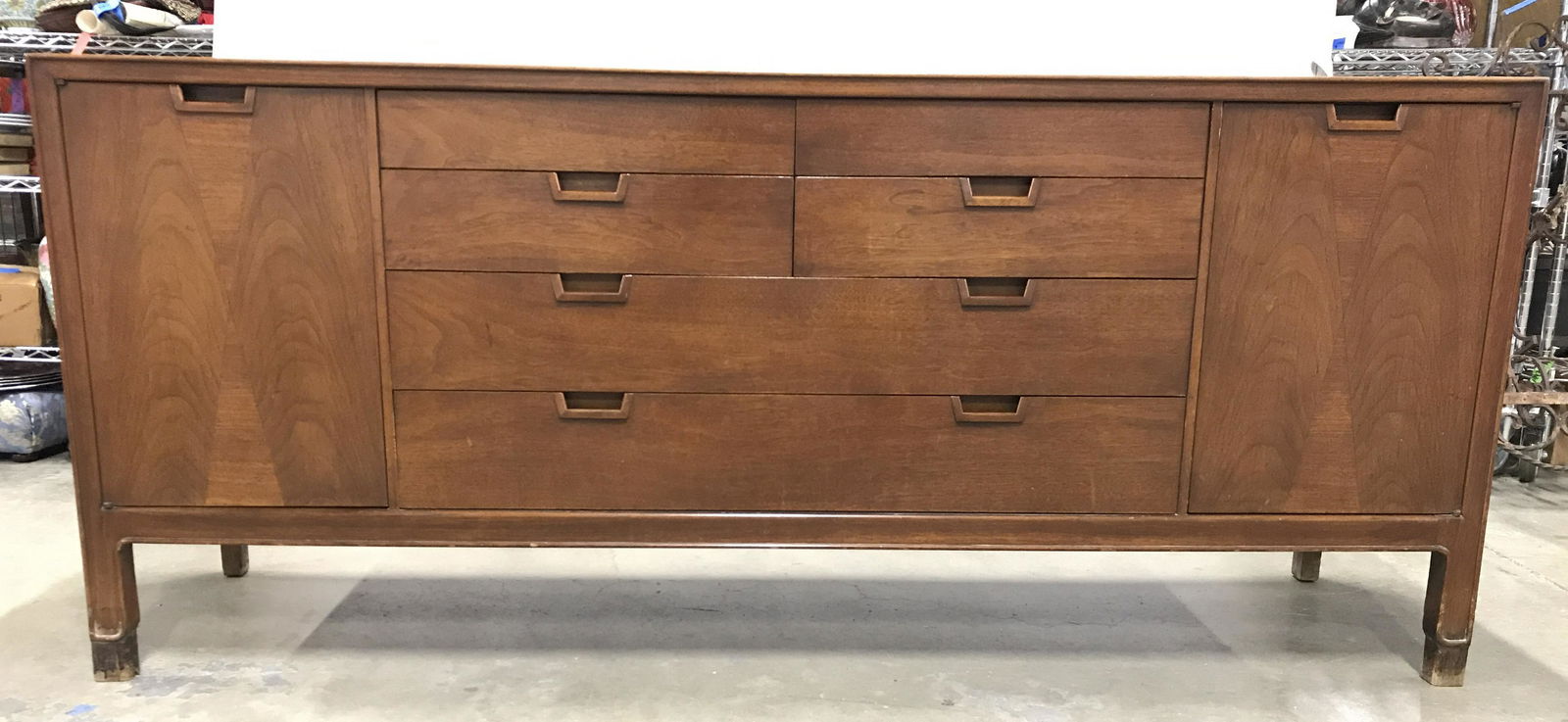 JANUS COLLECTION MCM Dresser by JOHN STUART: Interior of top left drawer is marked JANUS COLLECTION. Piece has 14 drawers 8 of which are inside cabinet area. Each drawer has hand dovetailing. Piece measures approximately 72 inches long 32 inches