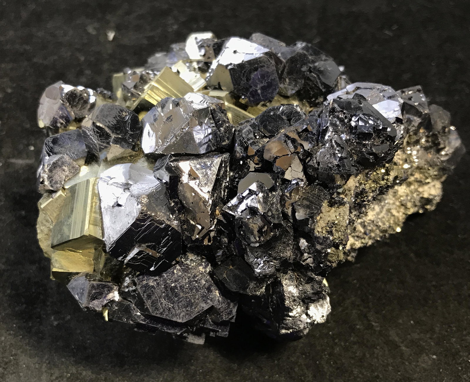 Peruvian Mined Galena & Pyrite Crystal Cluster: Peruvian mined Galena and Pyrite Crystal Cluster, mined from the Huanzala mine in Peru, unique in its own shape and size, a metallic black and gold colored gem with smaller silver and white stones mix