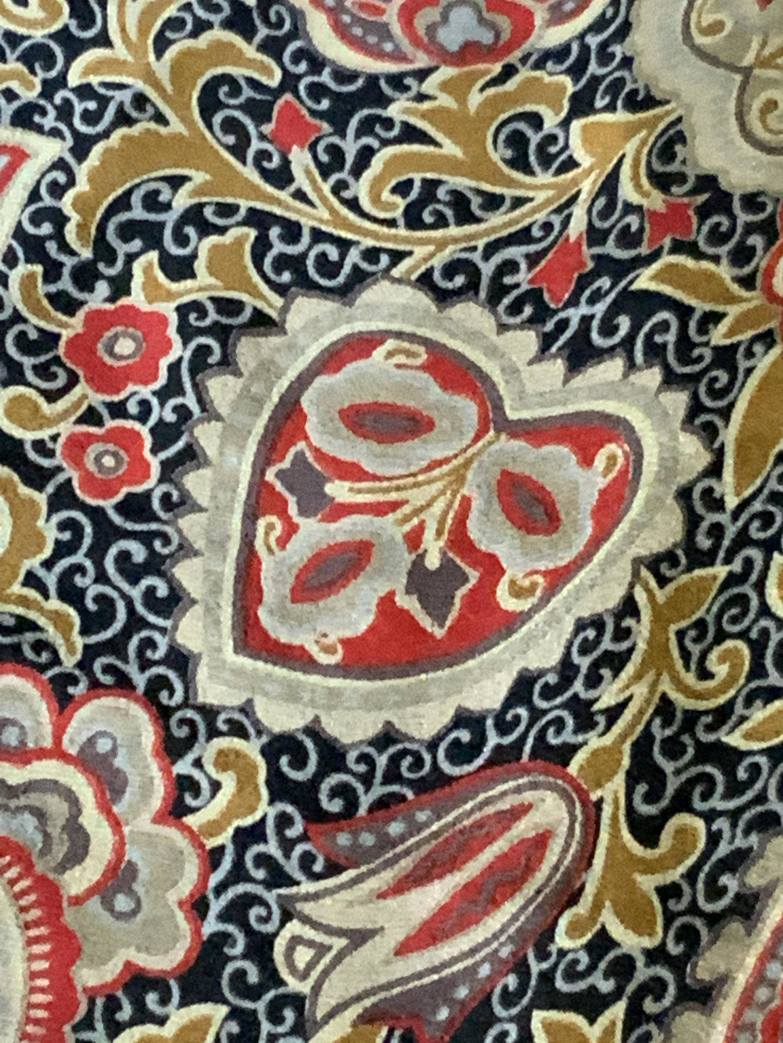 GIORGIO ARMANI Italian Patterned Silk Scarf: Reticulated pattern with muted earth tones and reds. Border is light brown. Tags read: GIORGIO ARMANI, Le Collezioni, Made in Italy. 100% Silk. Approx. 31 x 31 in. Giorgio Armani, Giorgio Armani Scarf