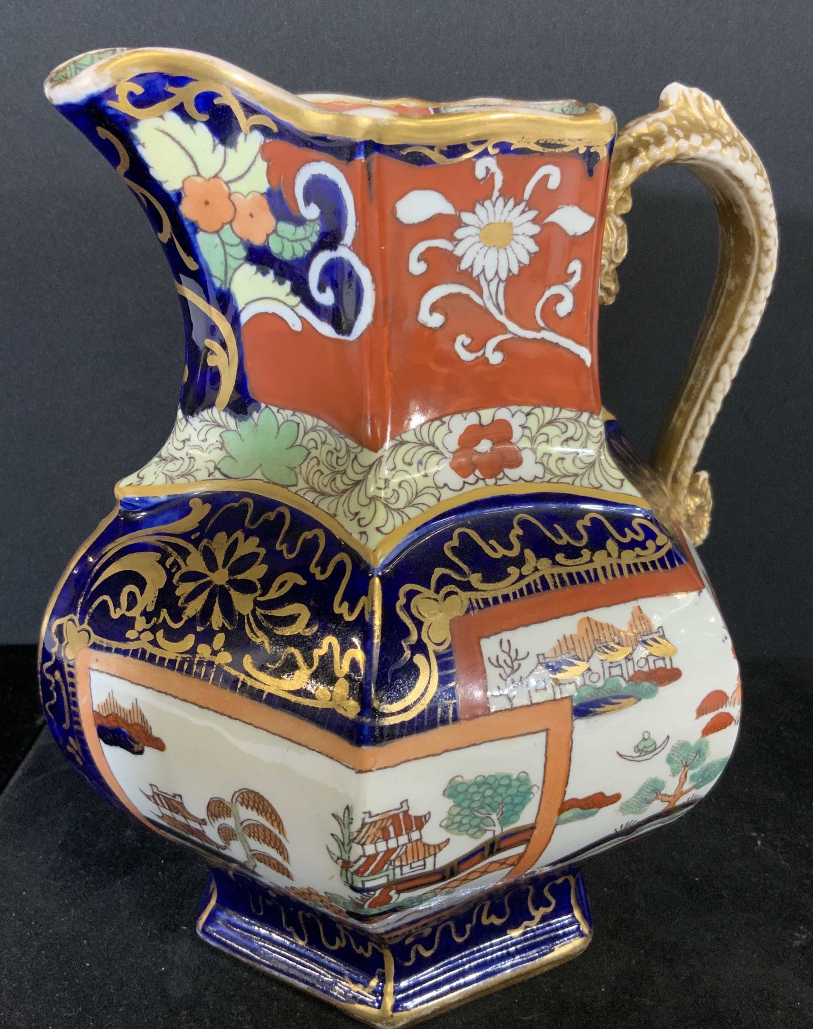 MASON’S Antique Ironstone China Fenton Pitcher: Circa 1840s Mason’s Ironstone China Fenton, Staffordshire, footed pitcher. Unusual shape, hand painted with gilt line work. Rich blues, reds, and greens. Intricate details, temple patterns and flora