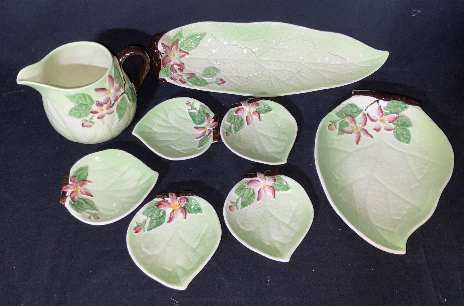Set 8 CARLTON WARE Porcelain Majolica, England: Vintage Hand painted Green Leaf Majolica pieces. All hallmarked, read CARLTON WARE ENGLAND with hand written N. Pieces include Long serving platter 14.25 in. L by 4 3/8 in width. Wide leaf serving pla