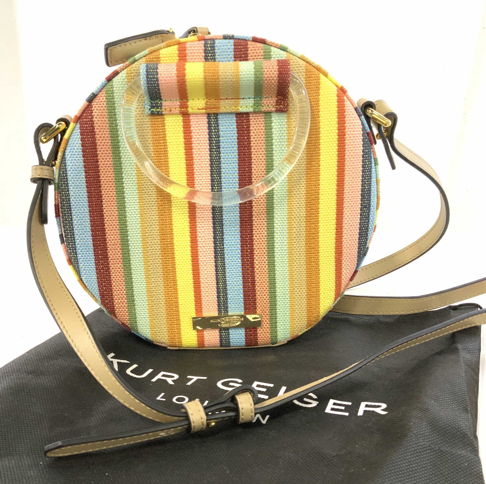 KURT GEIGER Harriet Round Striped Crossbody Bag,: Appears never used. cross body bag ( adjustable leather strap) with KURT GEIGER LONDON DUSTER BAG. Dual clear rolled handles - Gold toned hardware- Zip around closure - Interior features slip pocket -