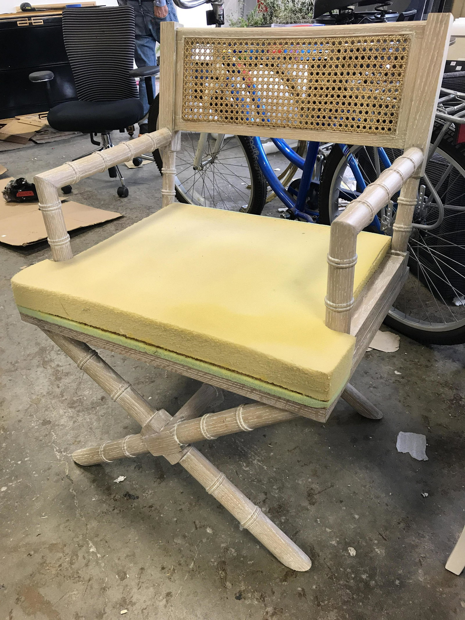 Pair Caned Back Wooden Directors Chairs: Lot includes 2 chairs. Structure of chairs appears to be wooden. Backrests are caned Each measures approximately 34 inches tall 25 inches wide 24 inches deep. Each needs reupholstering. Directors chai